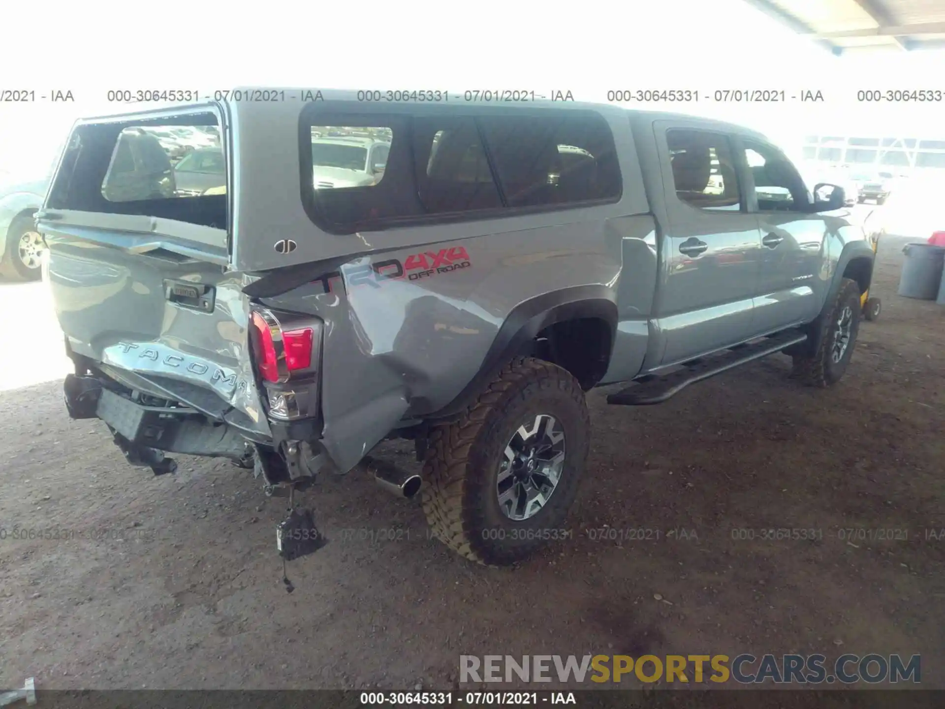 4 Photograph of a damaged car 3TMDZ5BNXMM106486 TOYOTA TACOMA 4WD 2021