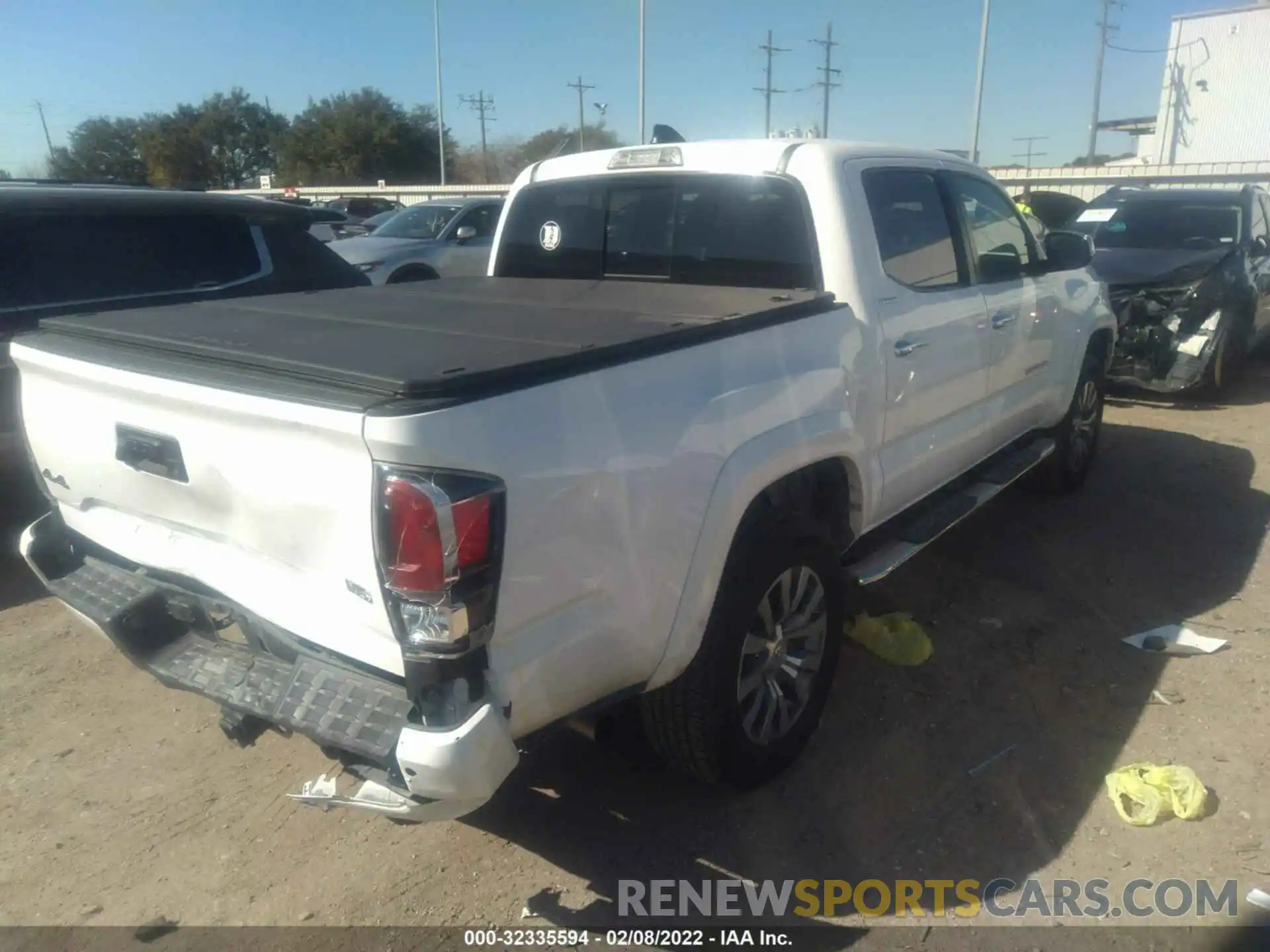 4 Photograph of a damaged car 3TMGZ5AN2MM421183 TOYOTA TACOMA 4WD 2021