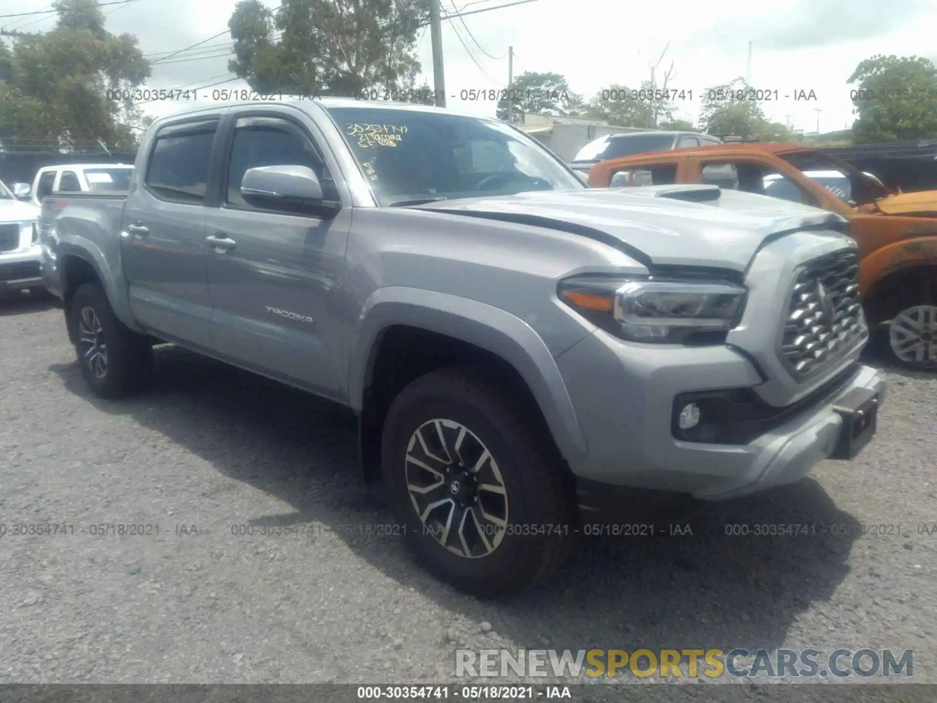 1 Photograph of a damaged car 3TYCZ5AN0MT021027 TOYOTA TACOMA 4WD 2021