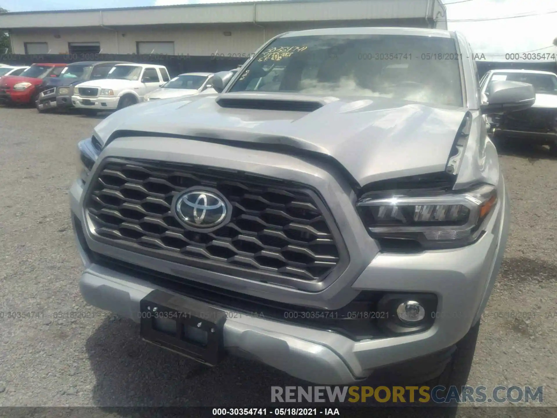 6 Photograph of a damaged car 3TYCZ5AN0MT021027 TOYOTA TACOMA 4WD 2021