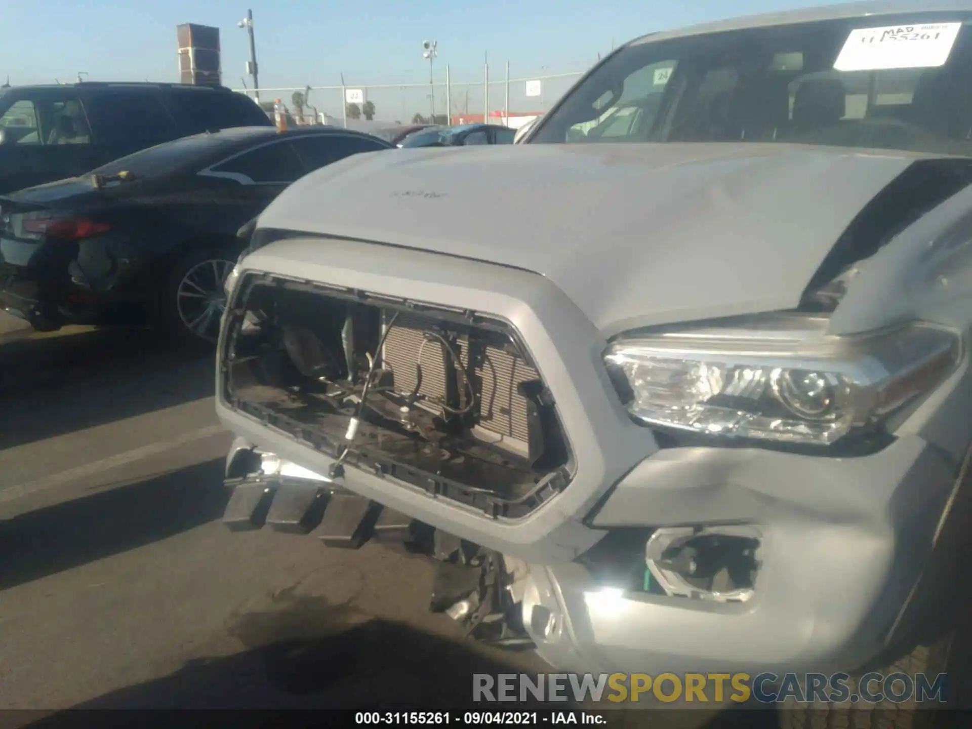 6 Photograph of a damaged car 3TYCZ5AN0MT031220 TOYOTA TACOMA 4WD 2021