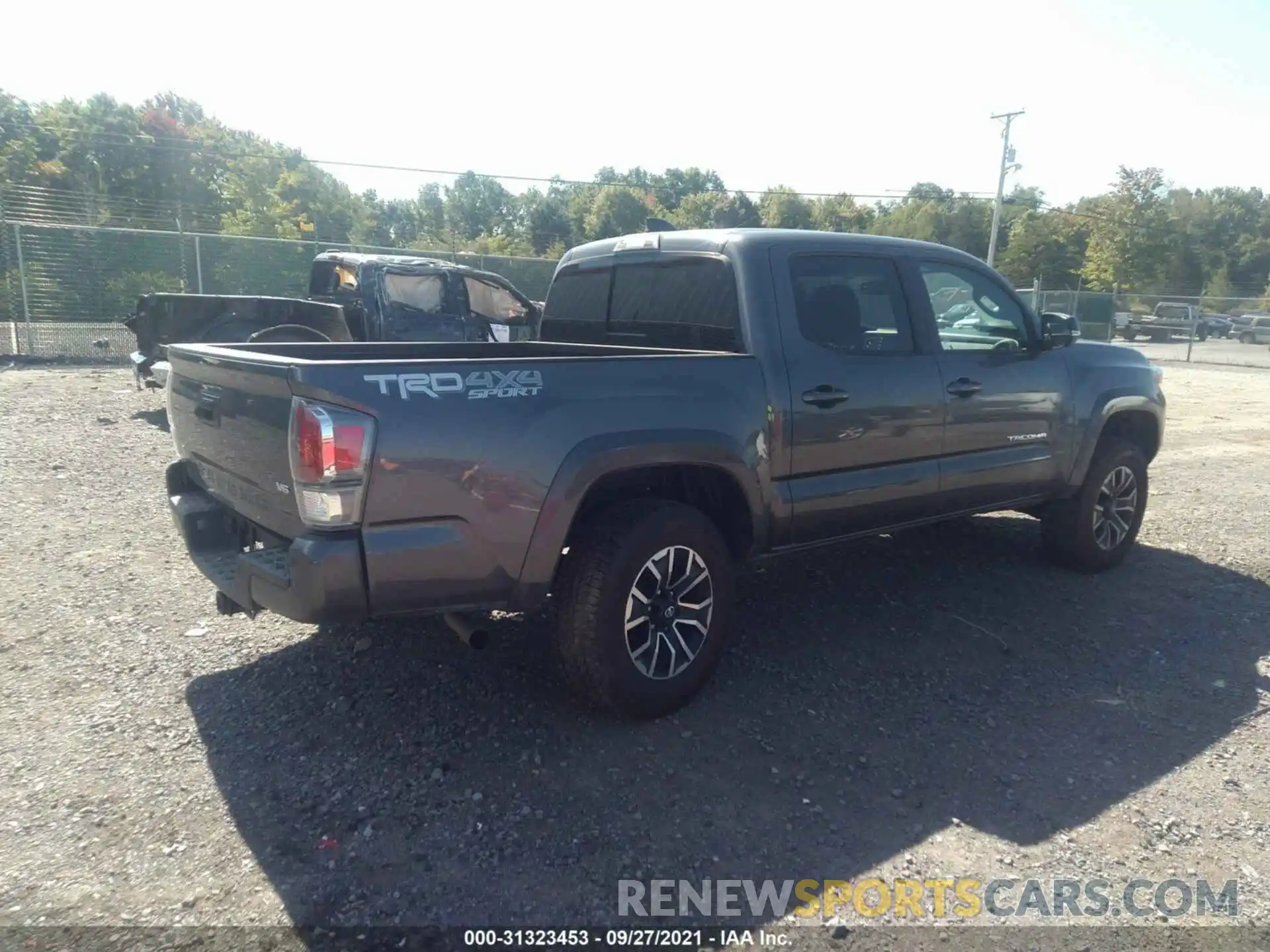 4 Photograph of a damaged car 3TYCZ5AN0MT041231 TOYOTA TACOMA 4WD 2021