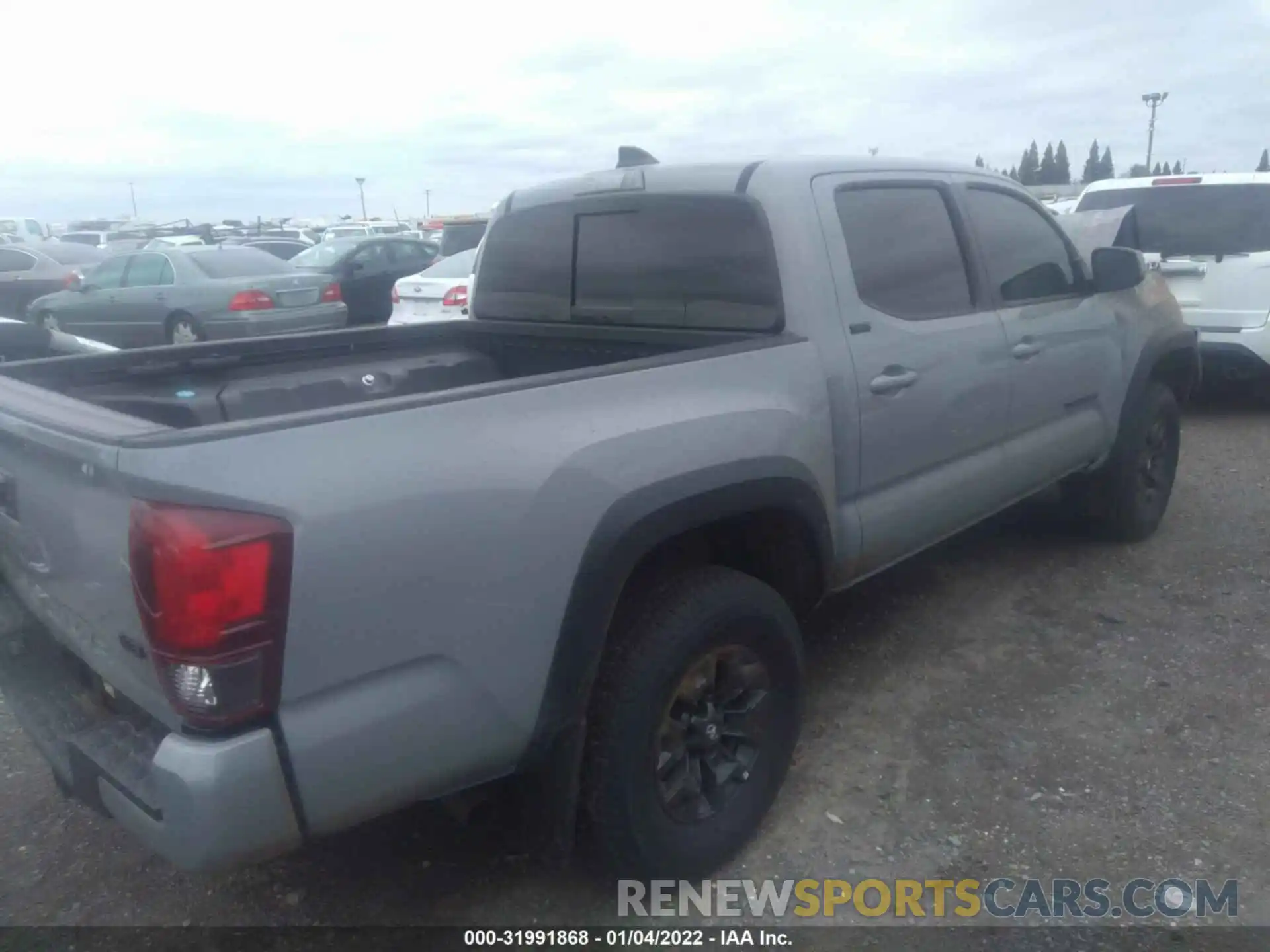 4 Photograph of a damaged car 3TYCZ5AN0MT047496 TOYOTA TACOMA 4WD 2021