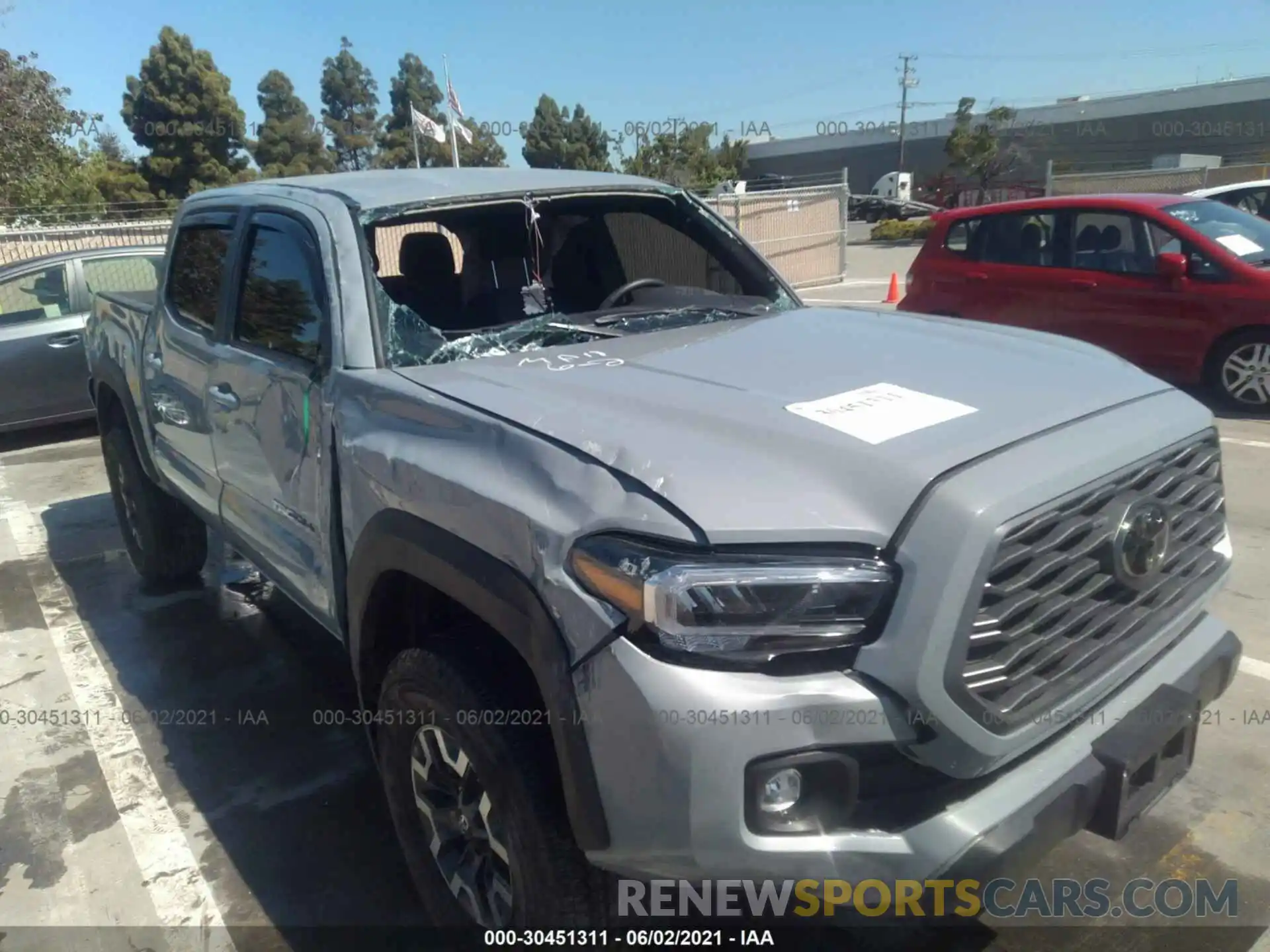 6 Photograph of a damaged car 3TYCZ5AN1MT016600 TOYOTA TACOMA 4WD 2021