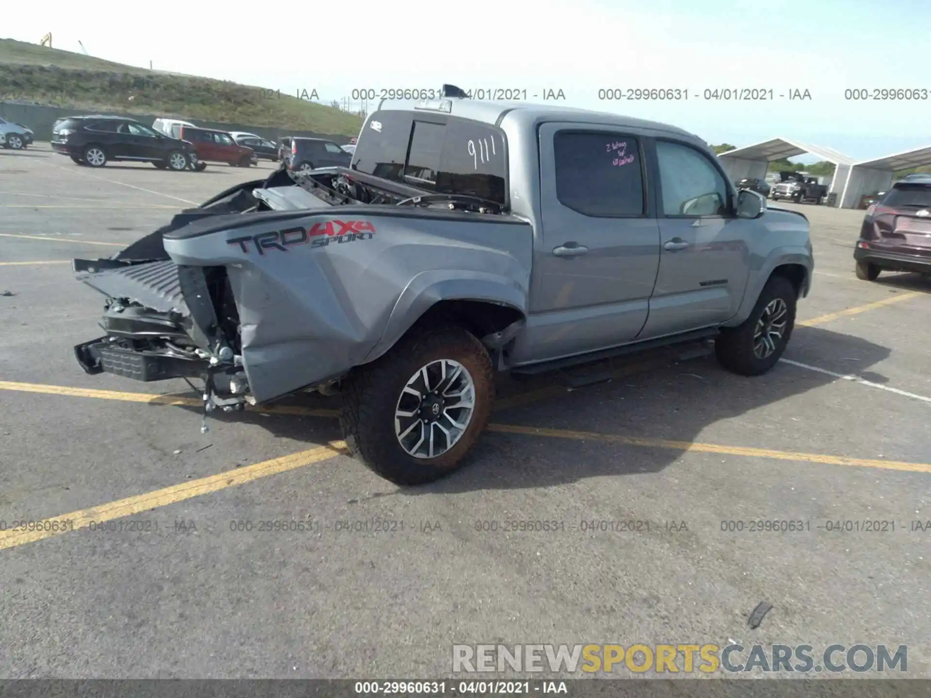 4 Photograph of a damaged car 3TYCZ5AN1MT019111 TOYOTA TACOMA 4WD 2021