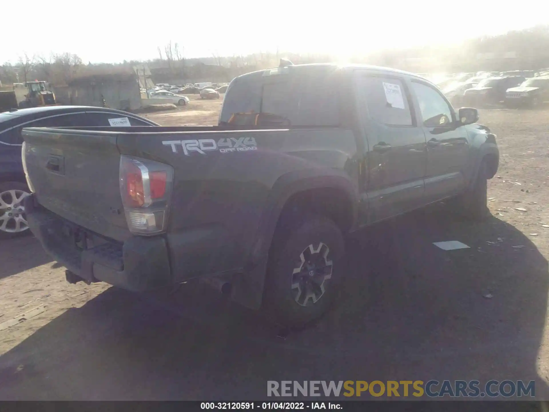 4 Photograph of a damaged car 3TYCZ5AN1MT051797 TOYOTA TACOMA 4WD 2021