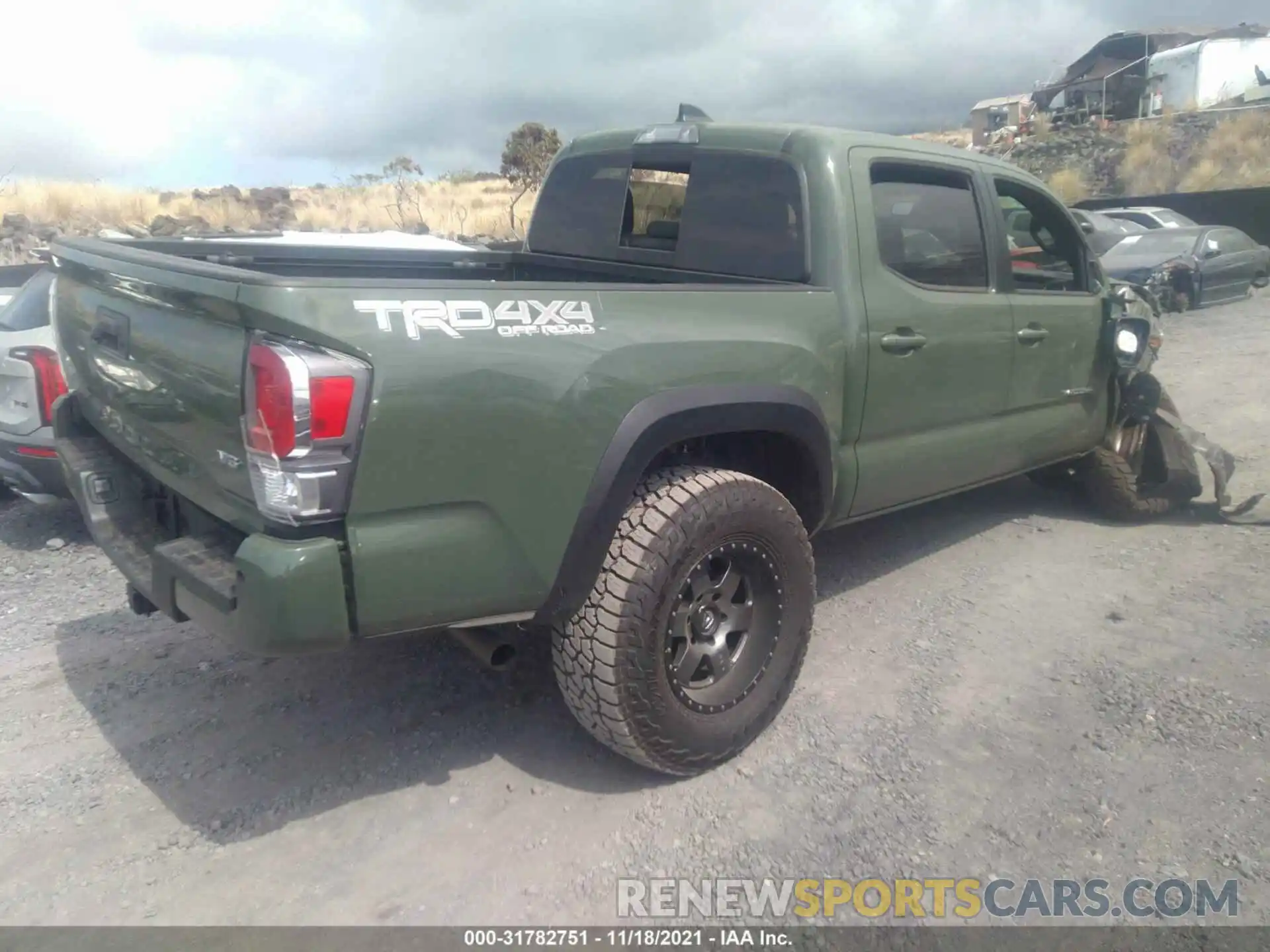 4 Photograph of a damaged car 3TYCZ5AN2MT024169 TOYOTA TACOMA 4WD 2021