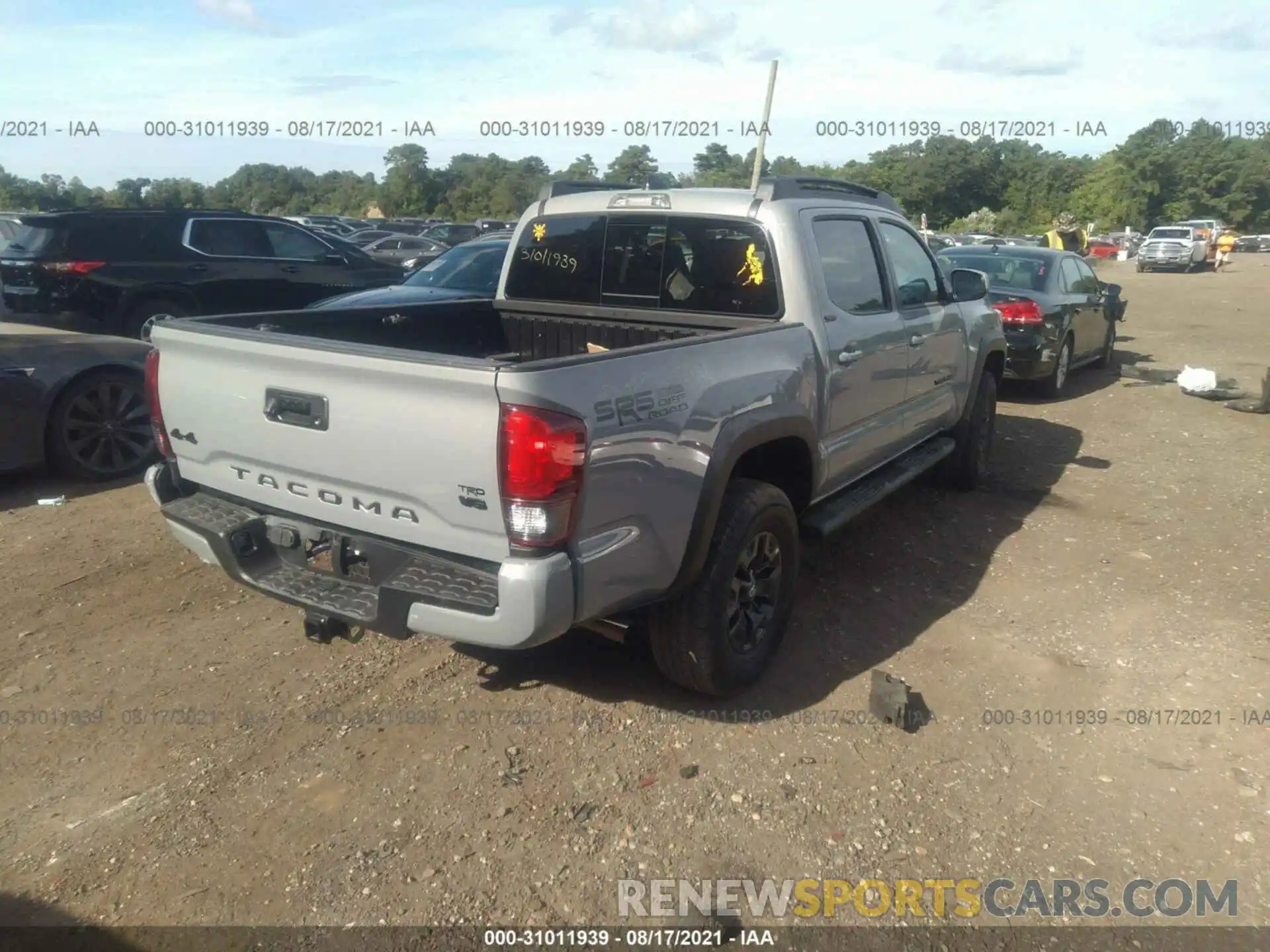 4 Photograph of a damaged car 3TYCZ5AN3MT032443 TOYOTA TACOMA 4WD 2021