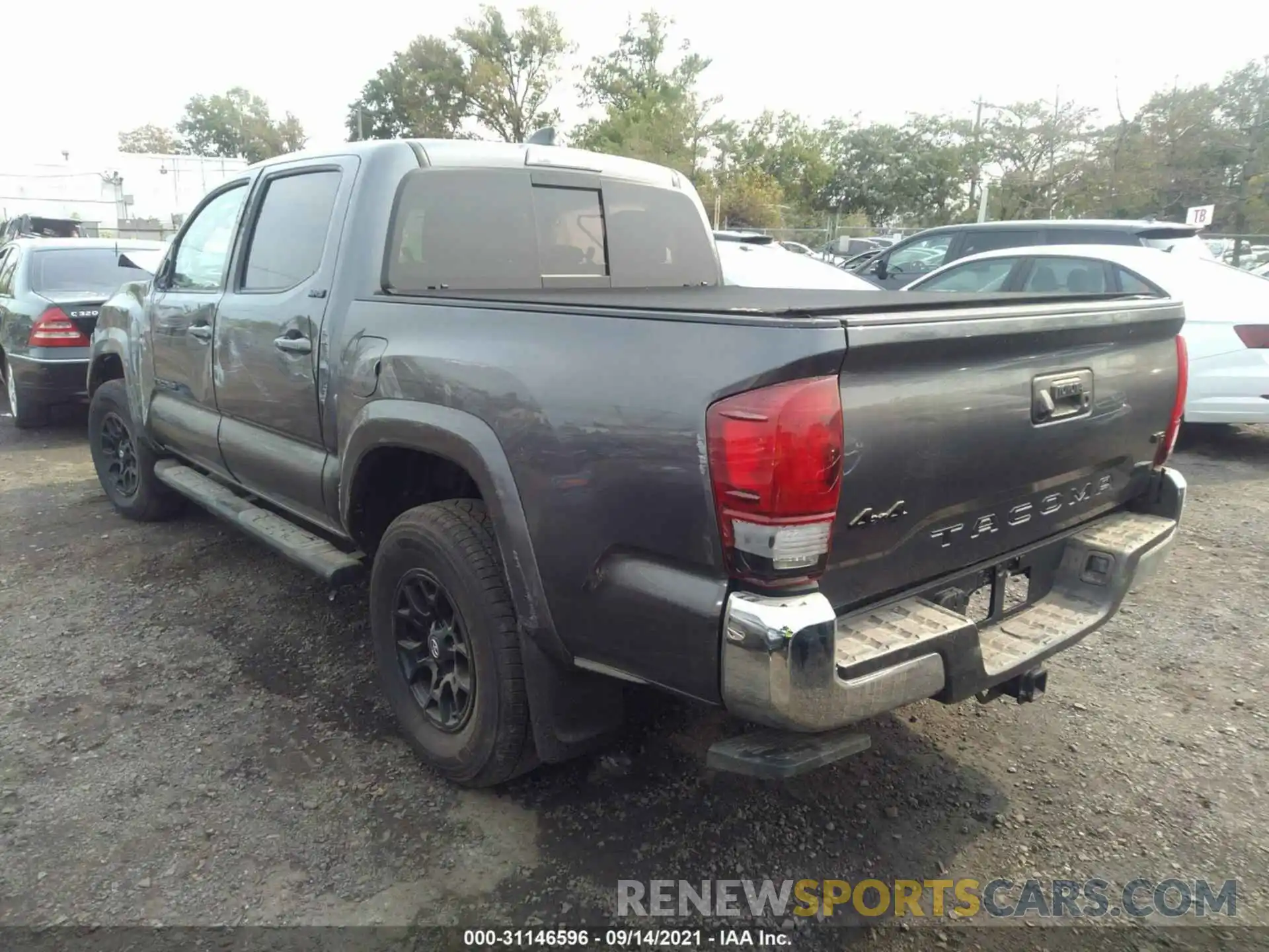 3 Photograph of a damaged car 3TYCZ5AN3MT033964 TOYOTA TACOMA 4WD 2021