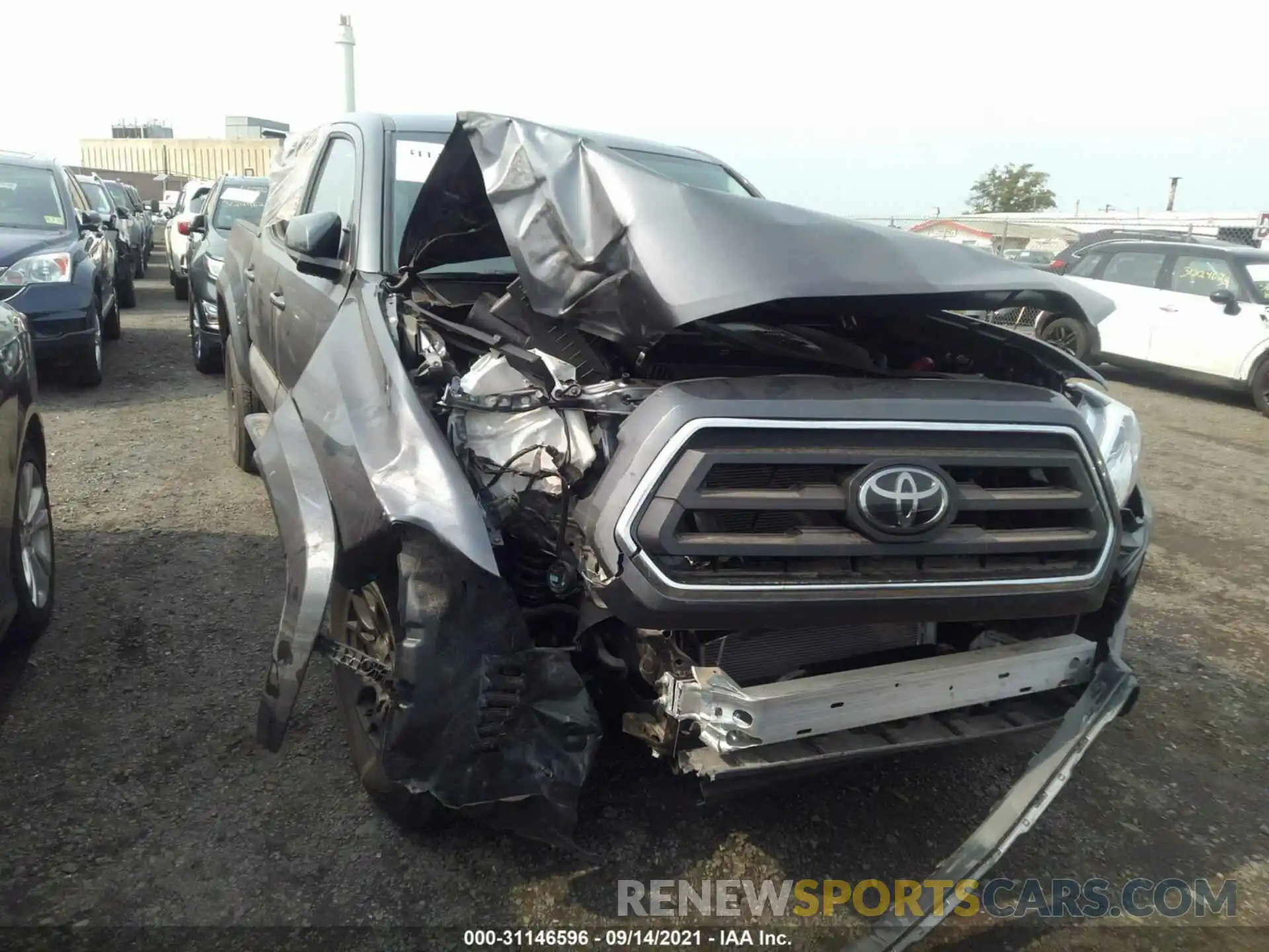 6 Photograph of a damaged car 3TYCZ5AN3MT033964 TOYOTA TACOMA 4WD 2021