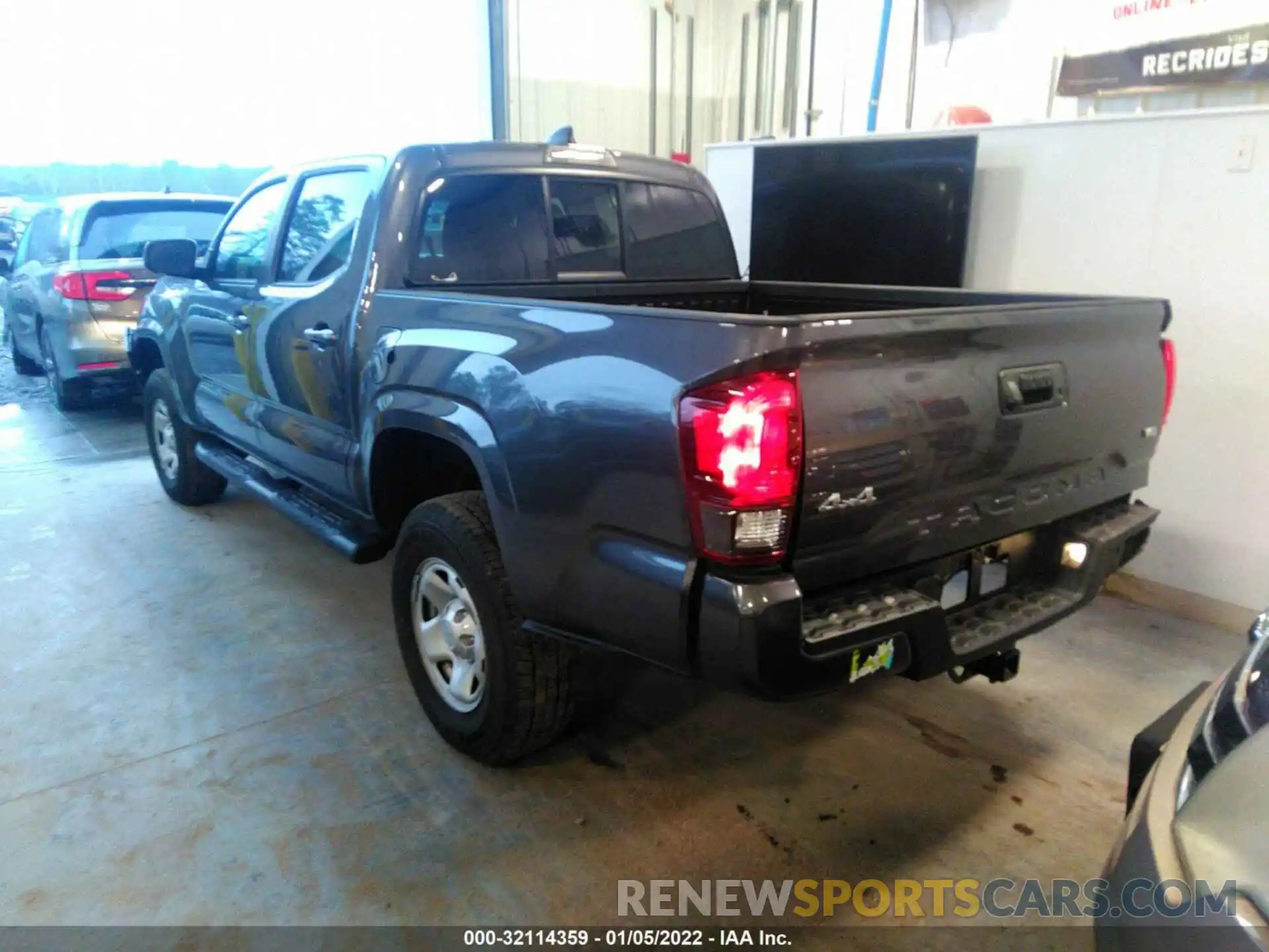 3 Photograph of a damaged car 3TYCZ5AN3MT041594 TOYOTA TACOMA 4WD 2021