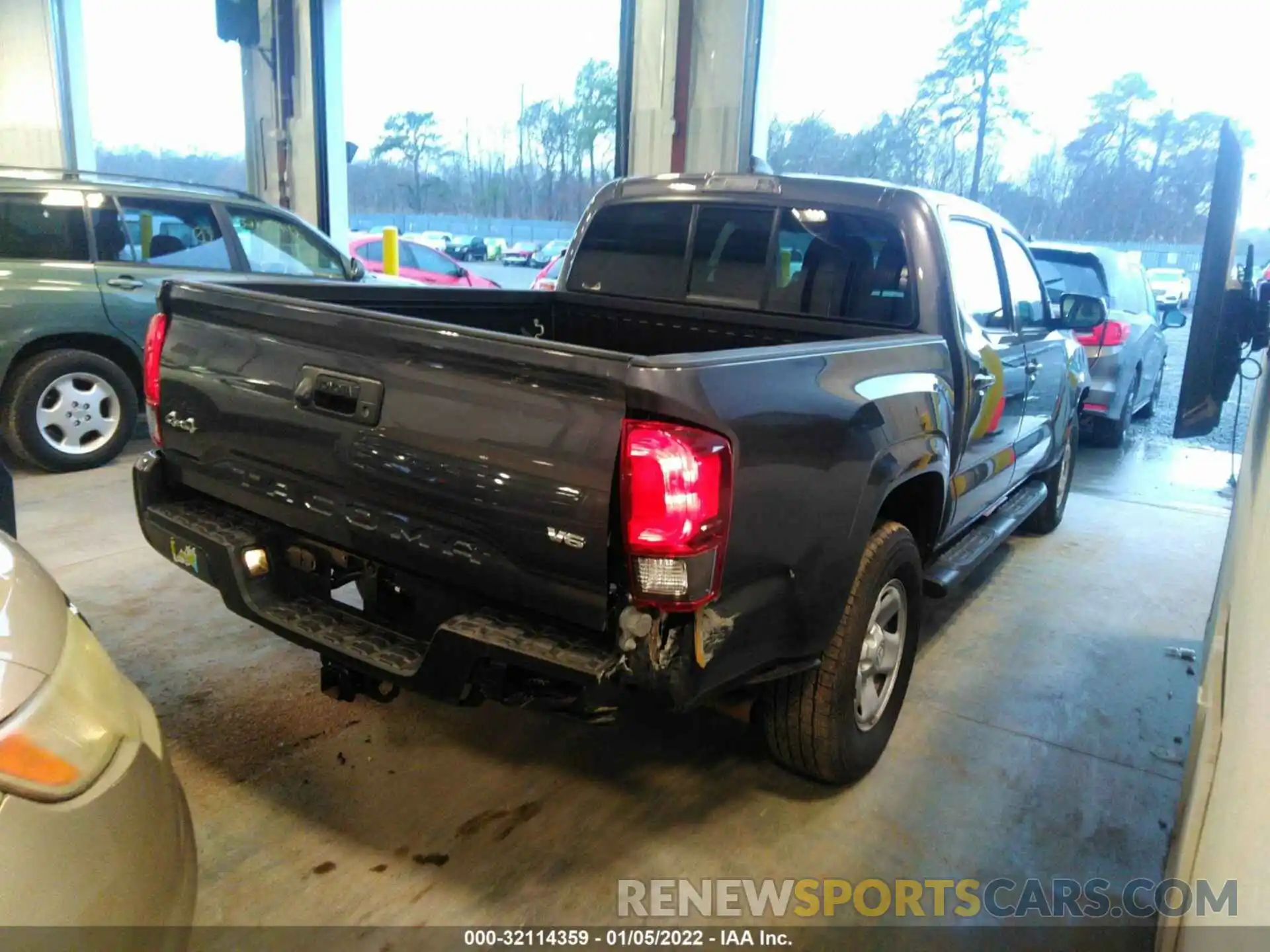 4 Photograph of a damaged car 3TYCZ5AN3MT041594 TOYOTA TACOMA 4WD 2021