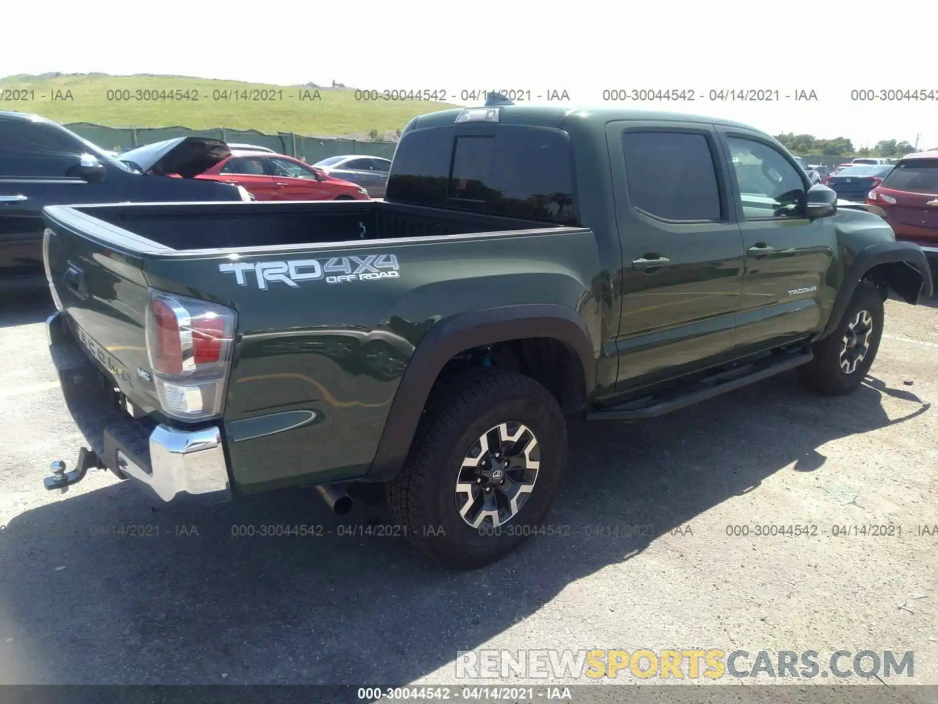 4 Photograph of a damaged car 3TYCZ5AN4MT018275 TOYOTA TACOMA 4WD 2021