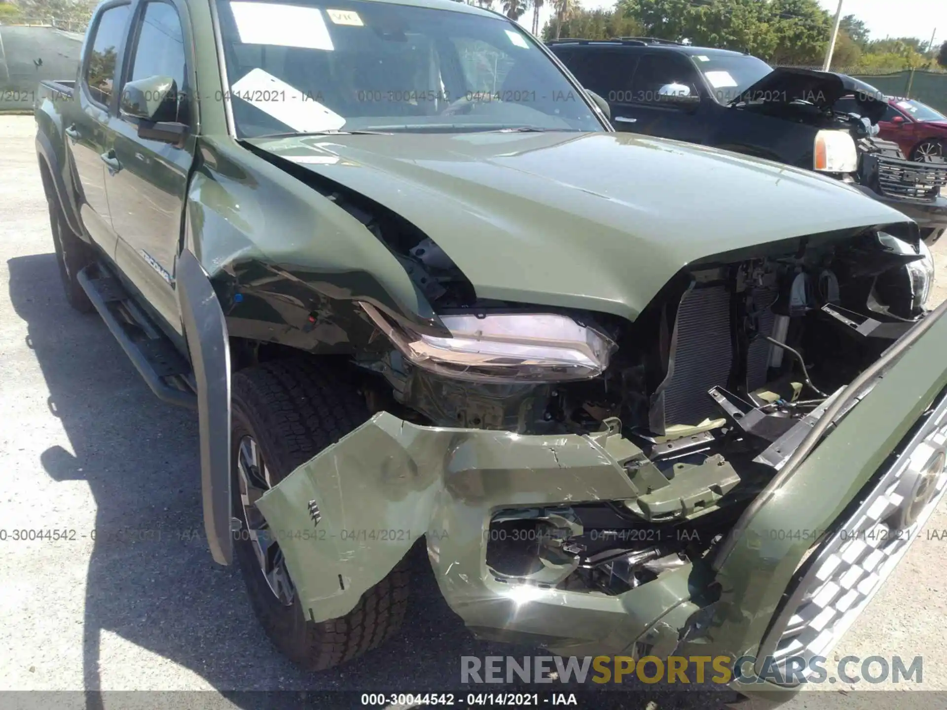 6 Photograph of a damaged car 3TYCZ5AN4MT018275 TOYOTA TACOMA 4WD 2021