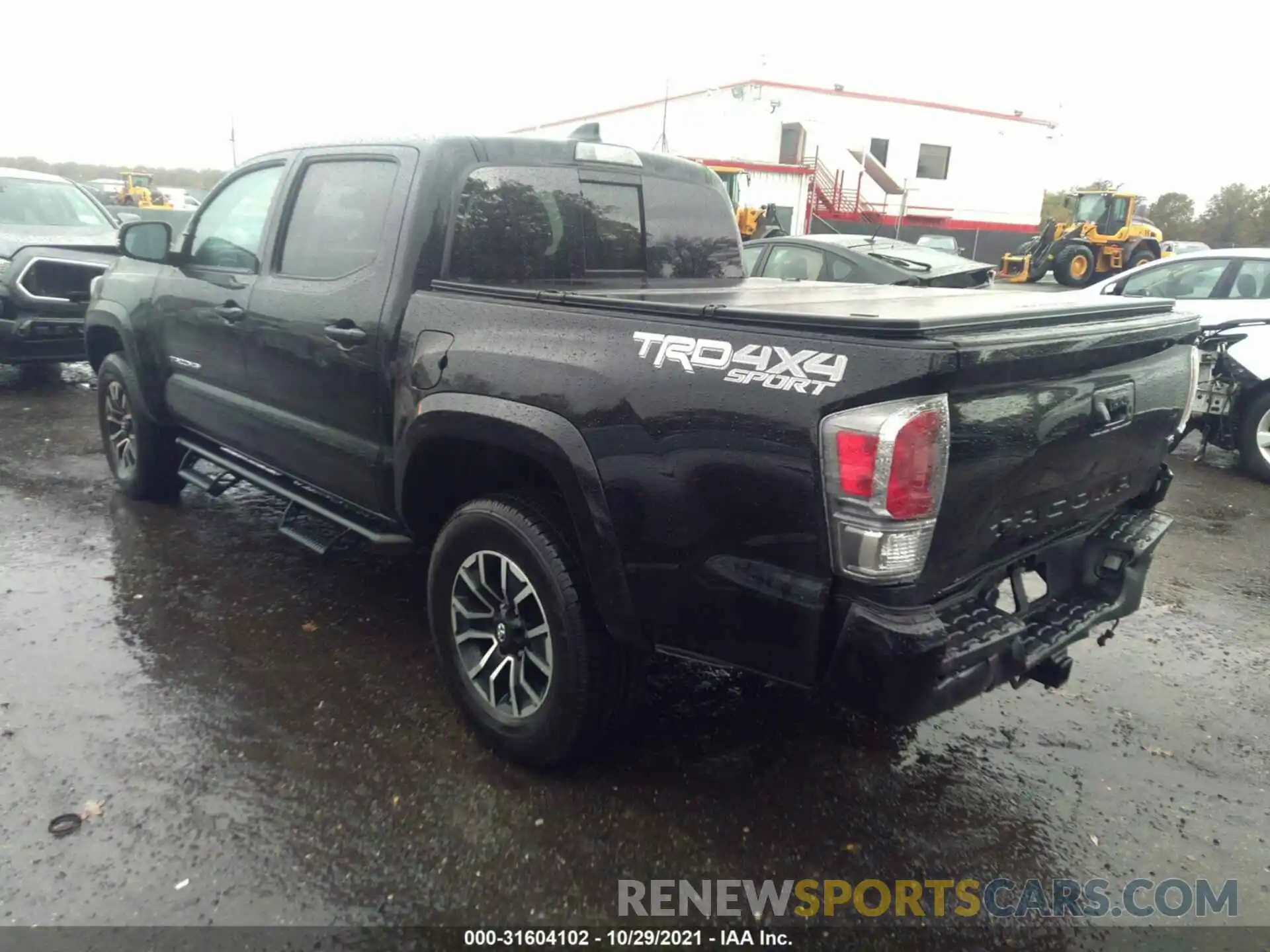 3 Photograph of a damaged car 3TYCZ5AN5MT021511 TOYOTA TACOMA 4WD 2021