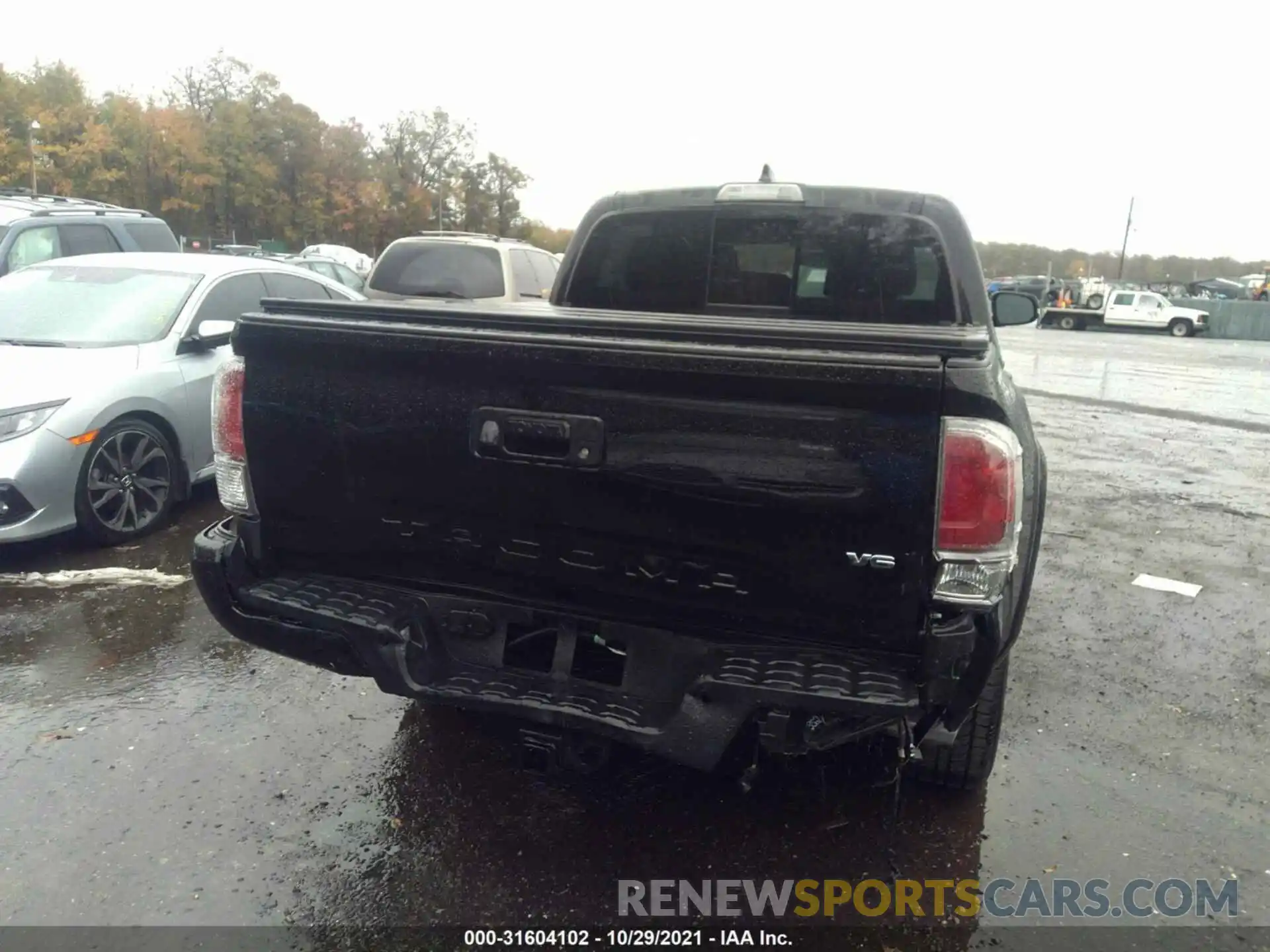 6 Photograph of a damaged car 3TYCZ5AN5MT021511 TOYOTA TACOMA 4WD 2021