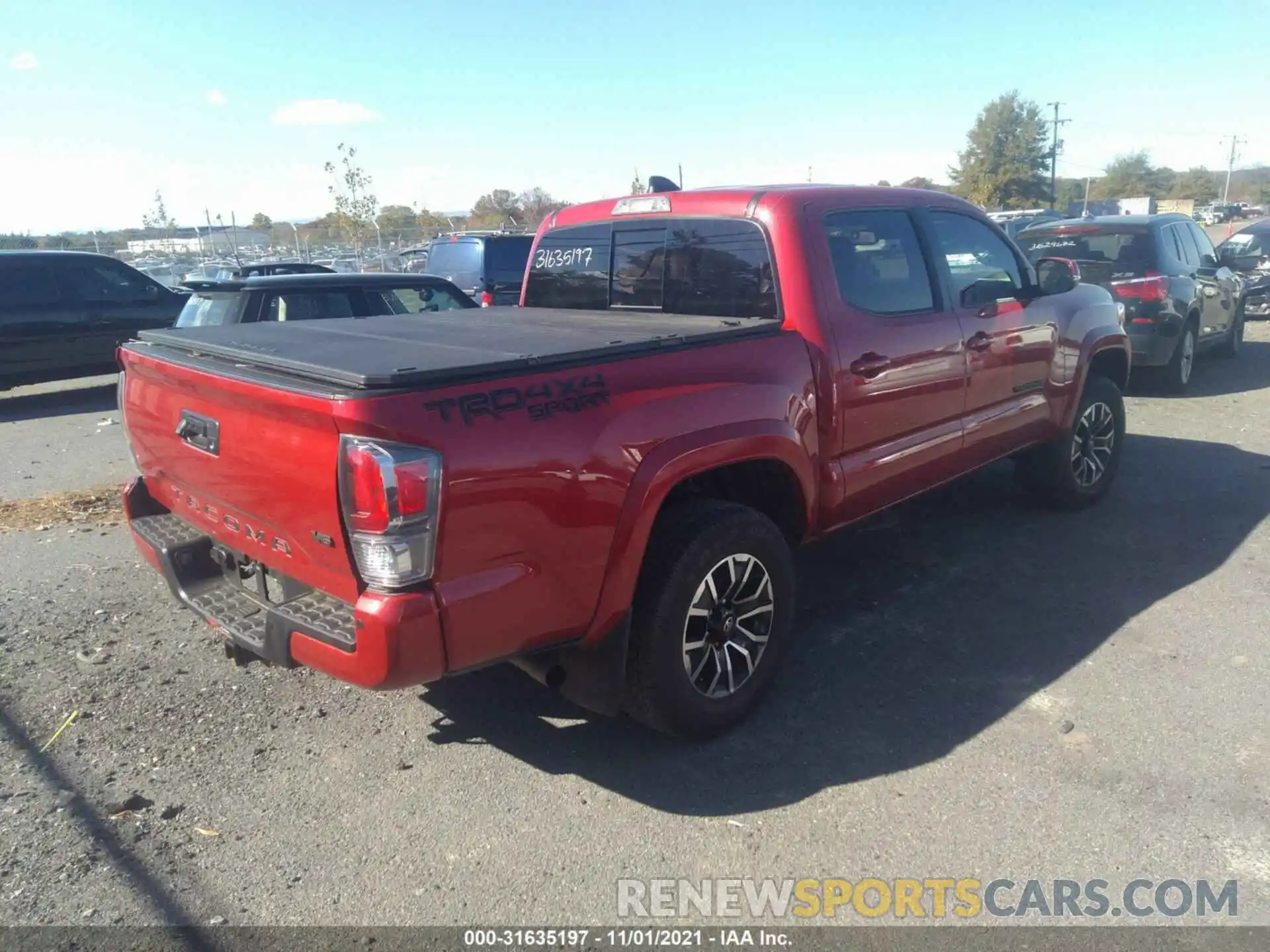 4 Photograph of a damaged car 3TYCZ5AN5MT025333 TOYOTA TACOMA 4WD 2021