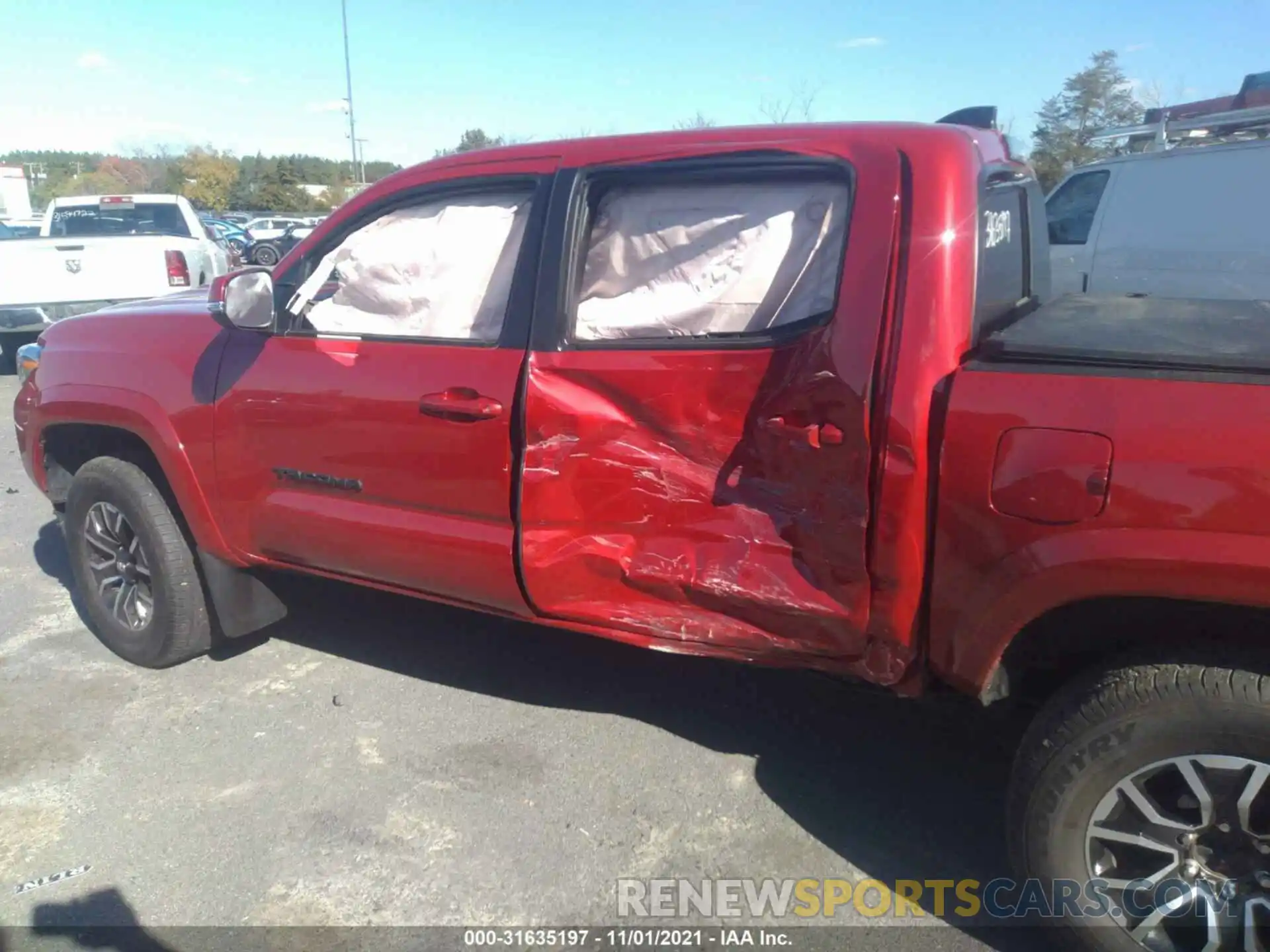 6 Photograph of a damaged car 3TYCZ5AN5MT025333 TOYOTA TACOMA 4WD 2021