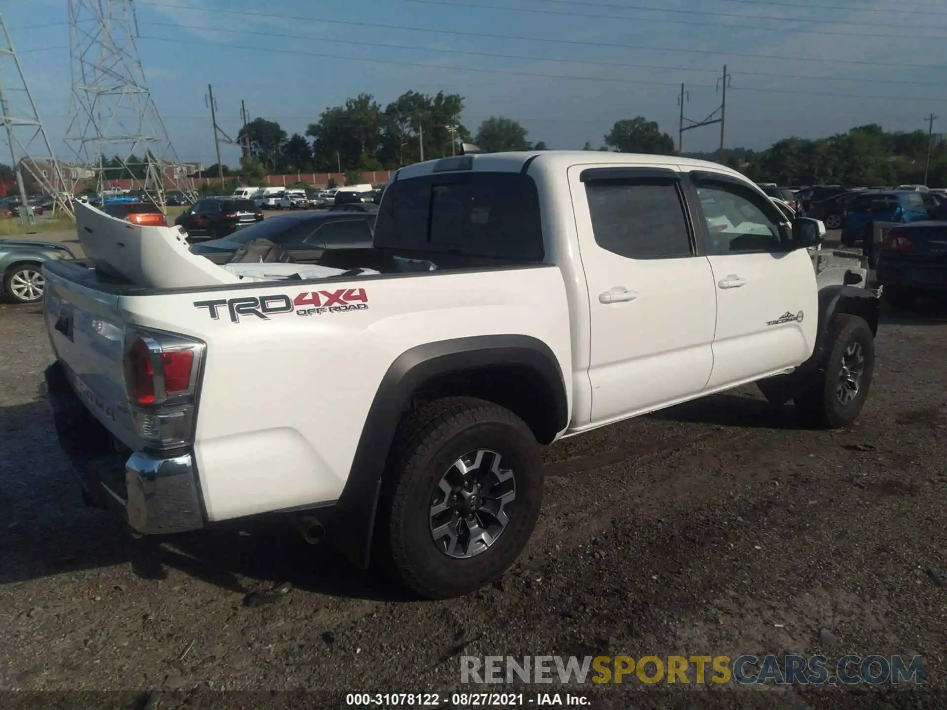 4 Photograph of a damaged car 3TYCZ5AN5MT034100 TOYOTA TACOMA 4WD 2021