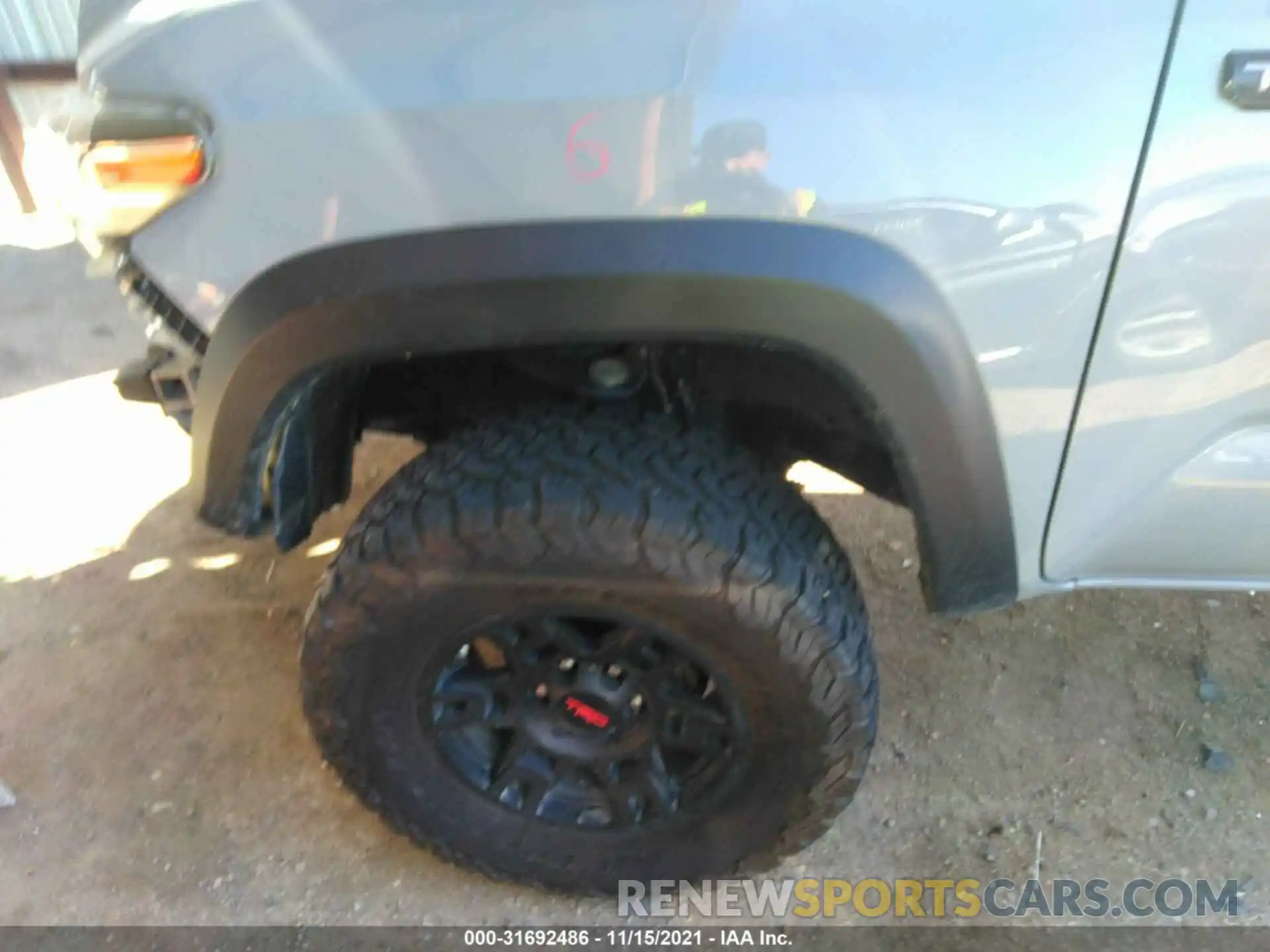 12 Photograph of a damaged car 3TYCZ5AN6MT013336 TOYOTA TACOMA 4WD 2021