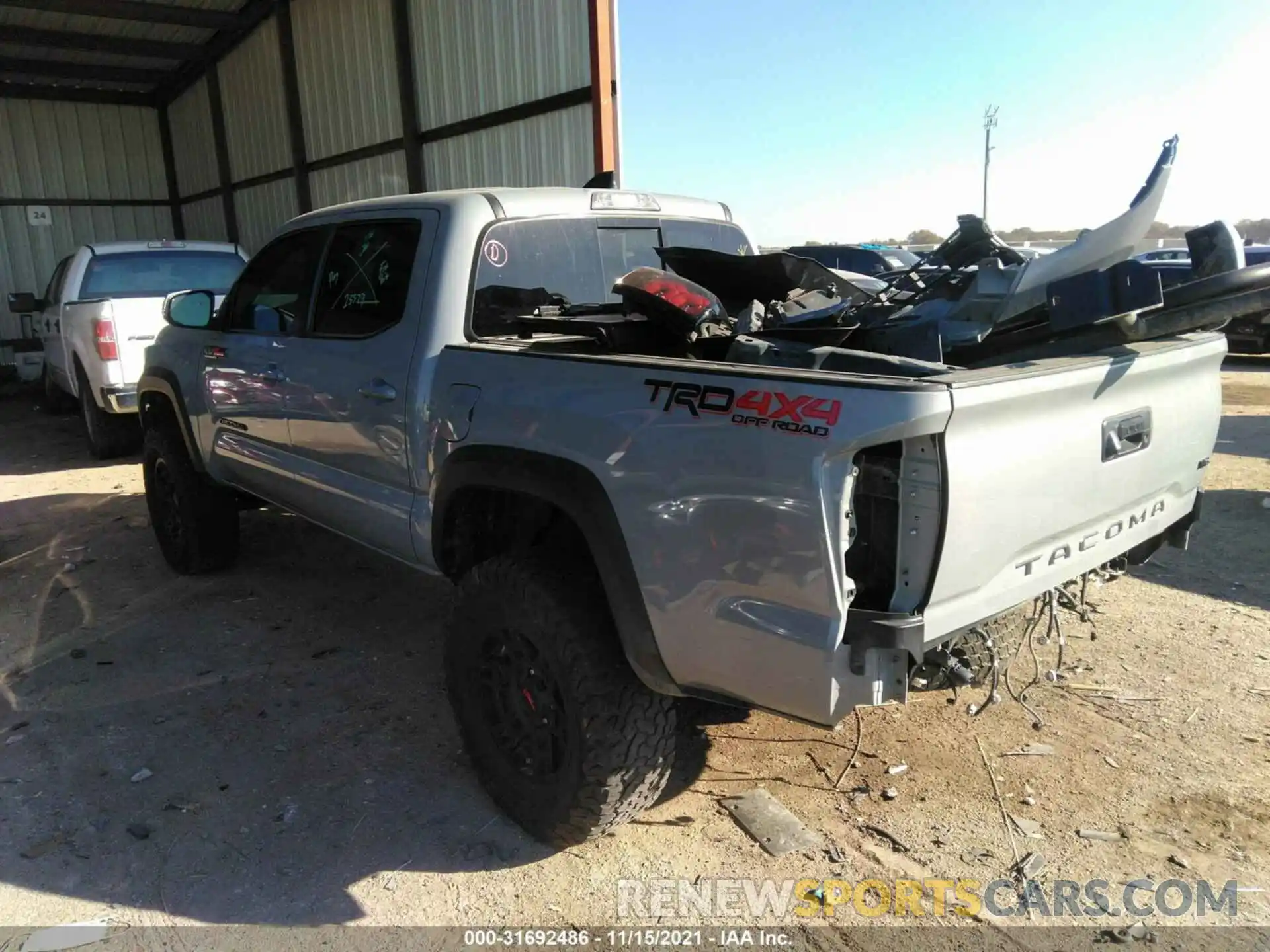 3 Photograph of a damaged car 3TYCZ5AN6MT013336 TOYOTA TACOMA 4WD 2021