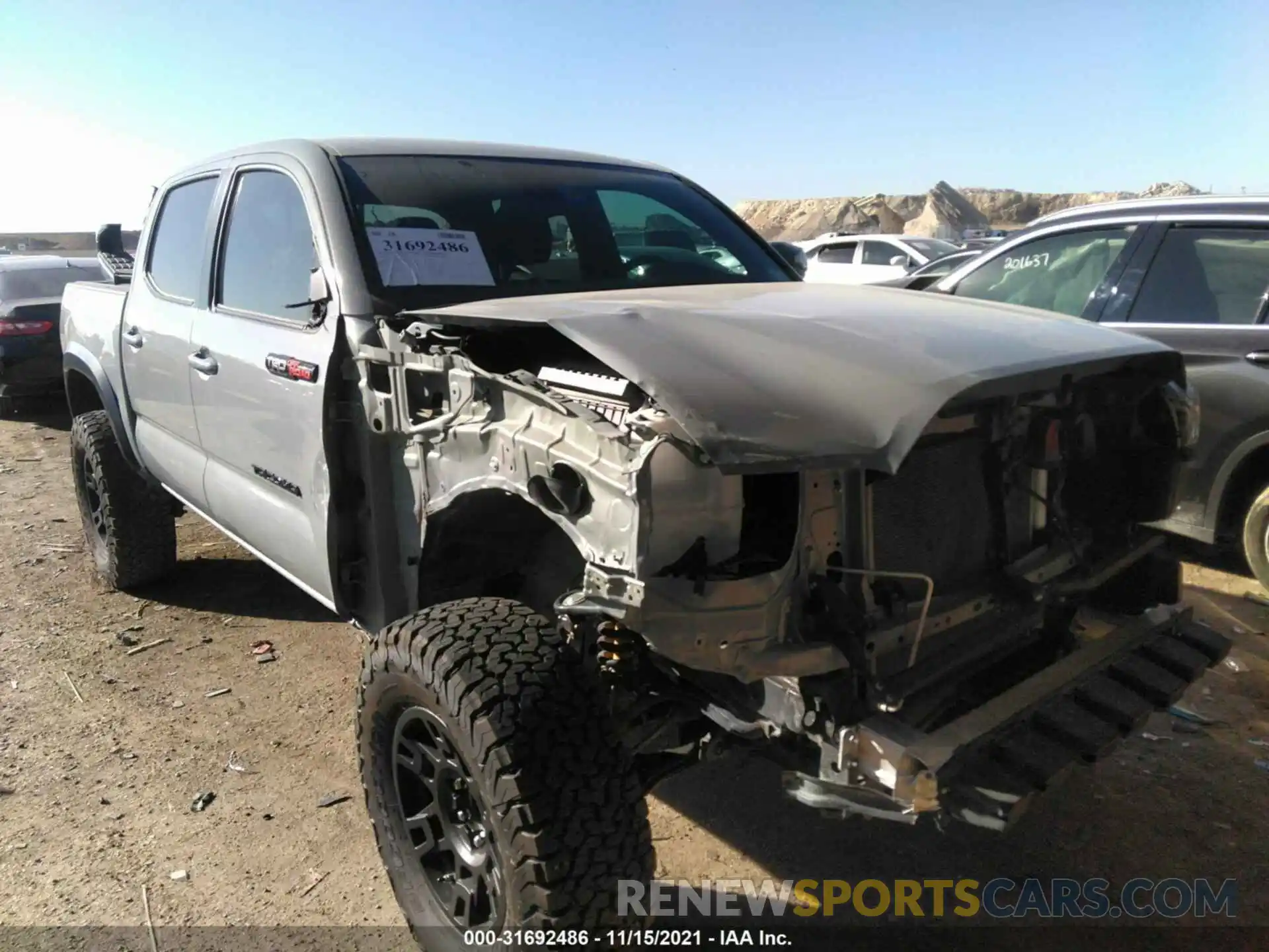 6 Photograph of a damaged car 3TYCZ5AN6MT013336 TOYOTA TACOMA 4WD 2021