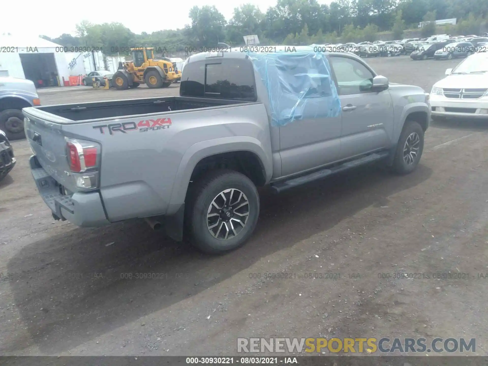 4 Photograph of a damaged car 3TYCZ5AN6MT017080 TOYOTA TACOMA 4WD 2021