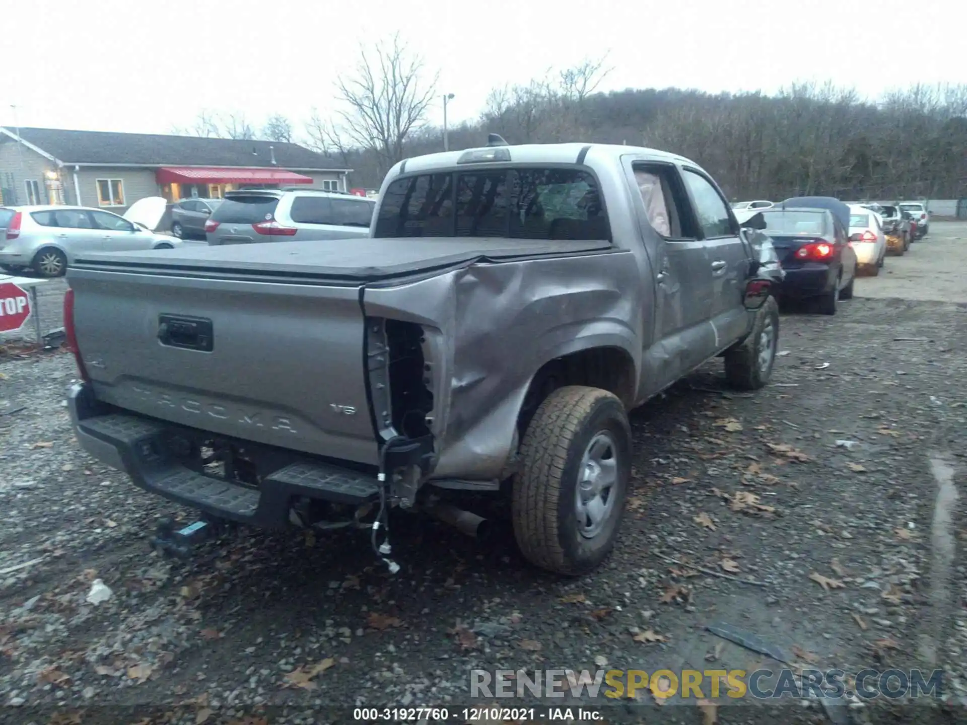 4 Photograph of a damaged car 3TYCZ5AN6MT027382 TOYOTA TACOMA 4WD 2021