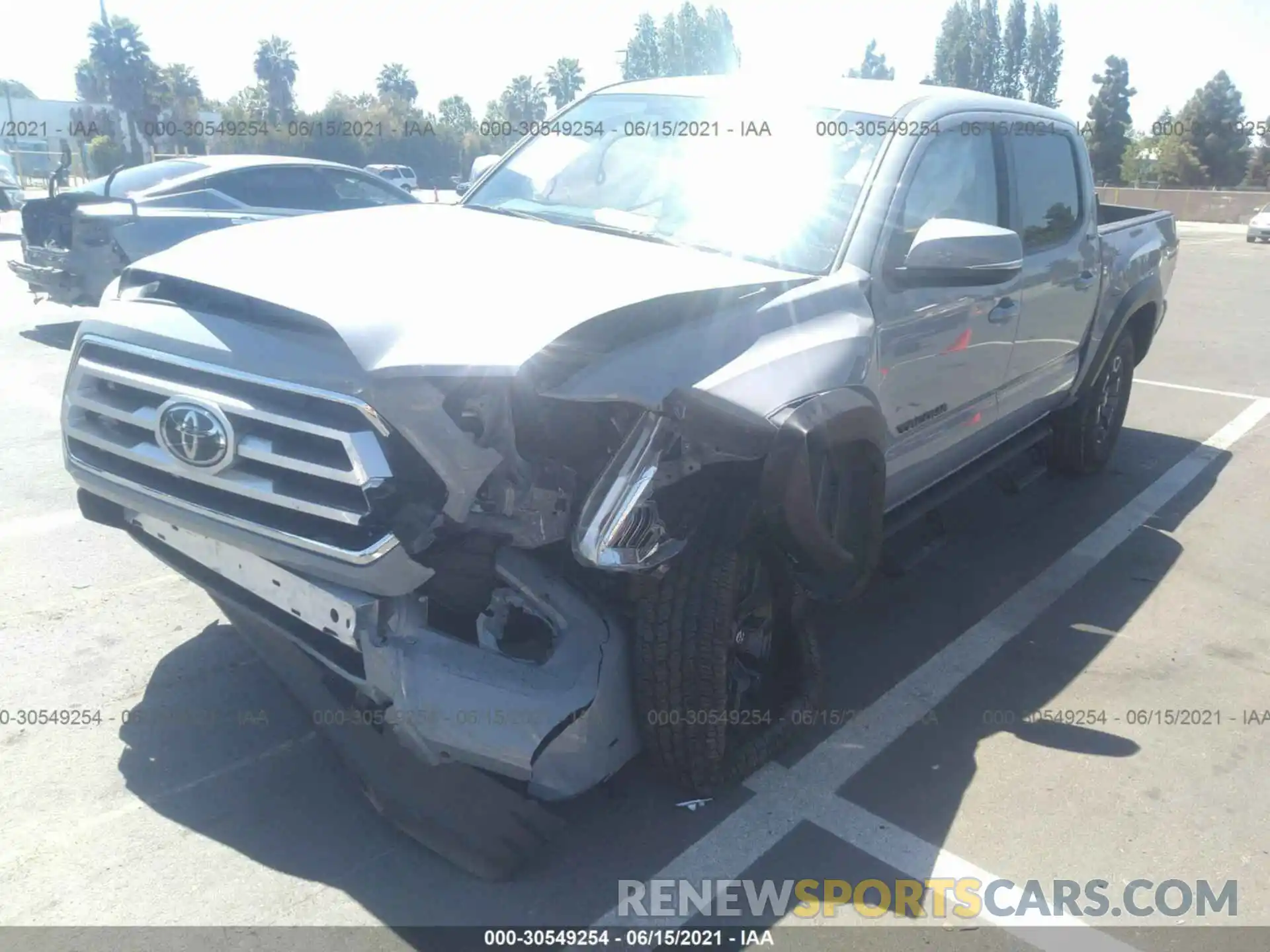 6 Photograph of a damaged car 3TYCZ5AN6MT028077 TOYOTA TACOMA 4WD 2021