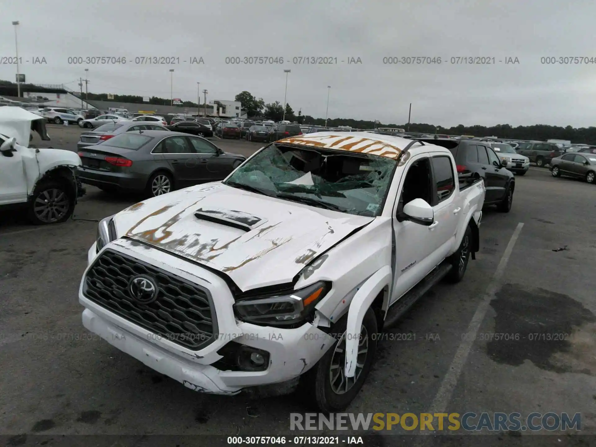 6 Photograph of a damaged car 3TYCZ5AN7MT032204 TOYOTA TACOMA 4WD 2021