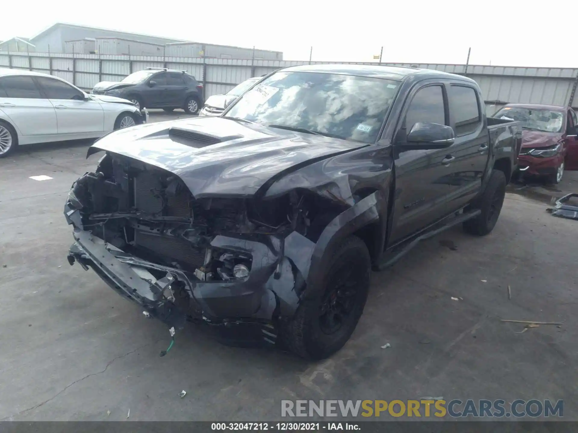 2 Photograph of a damaged car 3TYCZ5AN8MT009773 TOYOTA TACOMA 4WD 2021