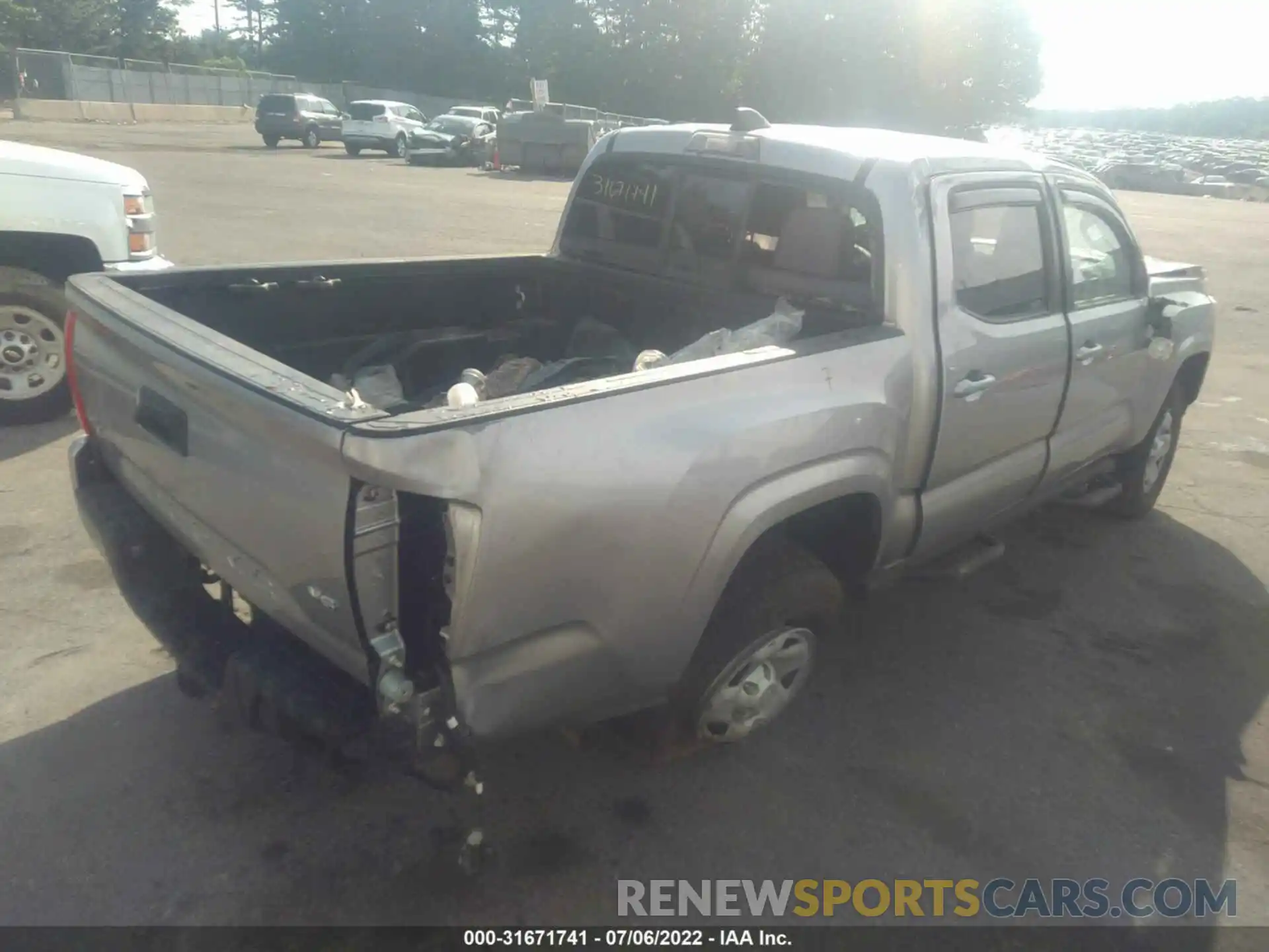 4 Photograph of a damaged car 3TYCZ5AN8MT022457 TOYOTA TACOMA 4WD 2021