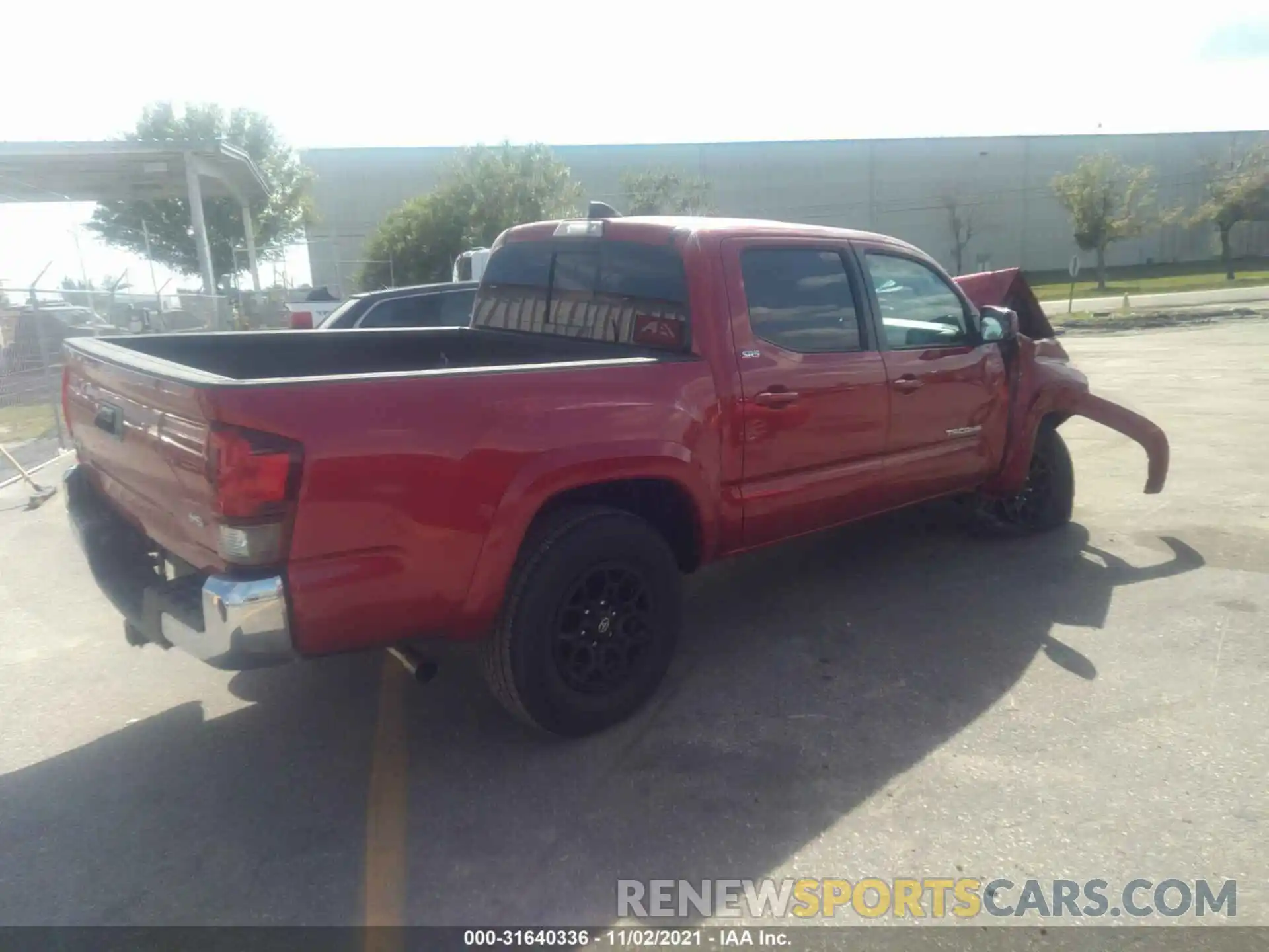 4 Photograph of a damaged car 3TYCZ5AN8MT052168 TOYOTA TACOMA 4WD 2021