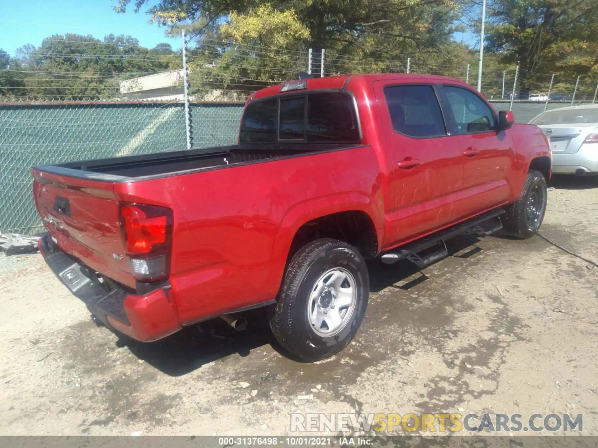 4 Photograph of a damaged car 3TYCZ5AN9MT030194 TOYOTA TACOMA 4WD 2021