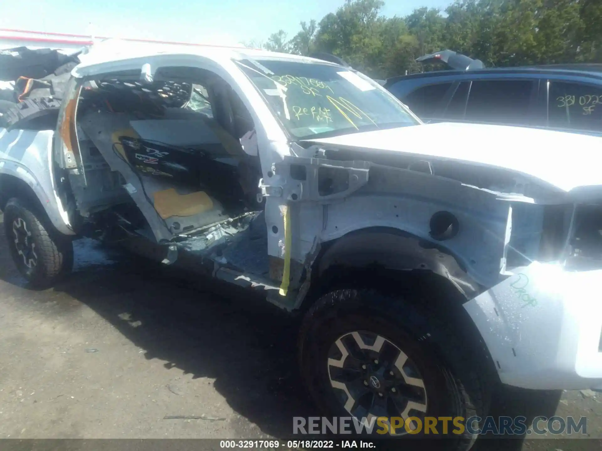 6 Photograph of a damaged car 3TYCZ5AN9MT035122 TOYOTA TACOMA 4WD 2021