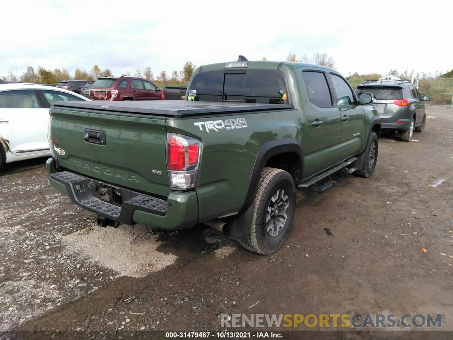 4 Photograph of a damaged car 3TYCZ5AN9MT035427 TOYOTA TACOMA 4WD 2021