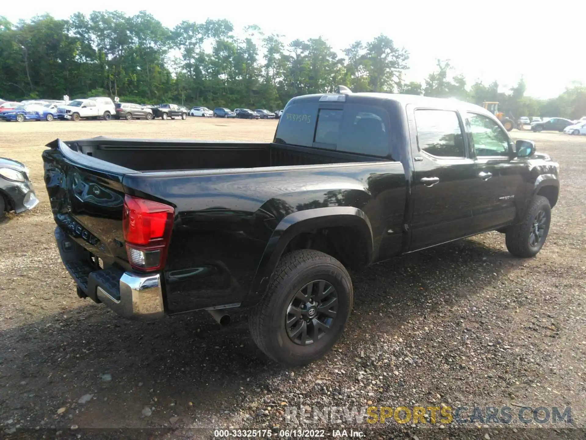 4 Photograph of a damaged car 3TYDZ5BN3MT001325 TOYOTA TACOMA 4WD 2021