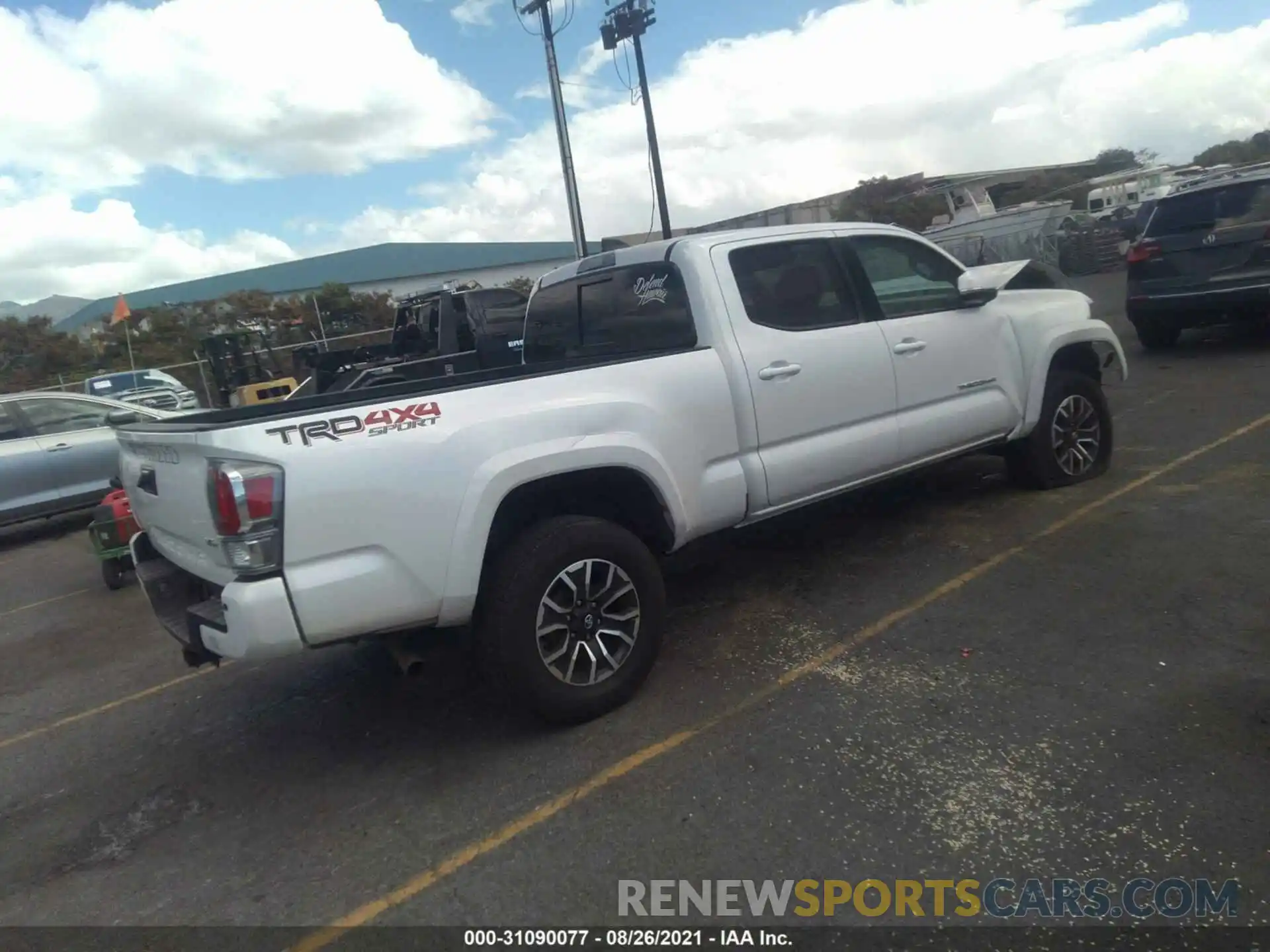 4 Photograph of a damaged car 3TYDZ5BN4MT000586 TOYOTA TACOMA 4WD 2021