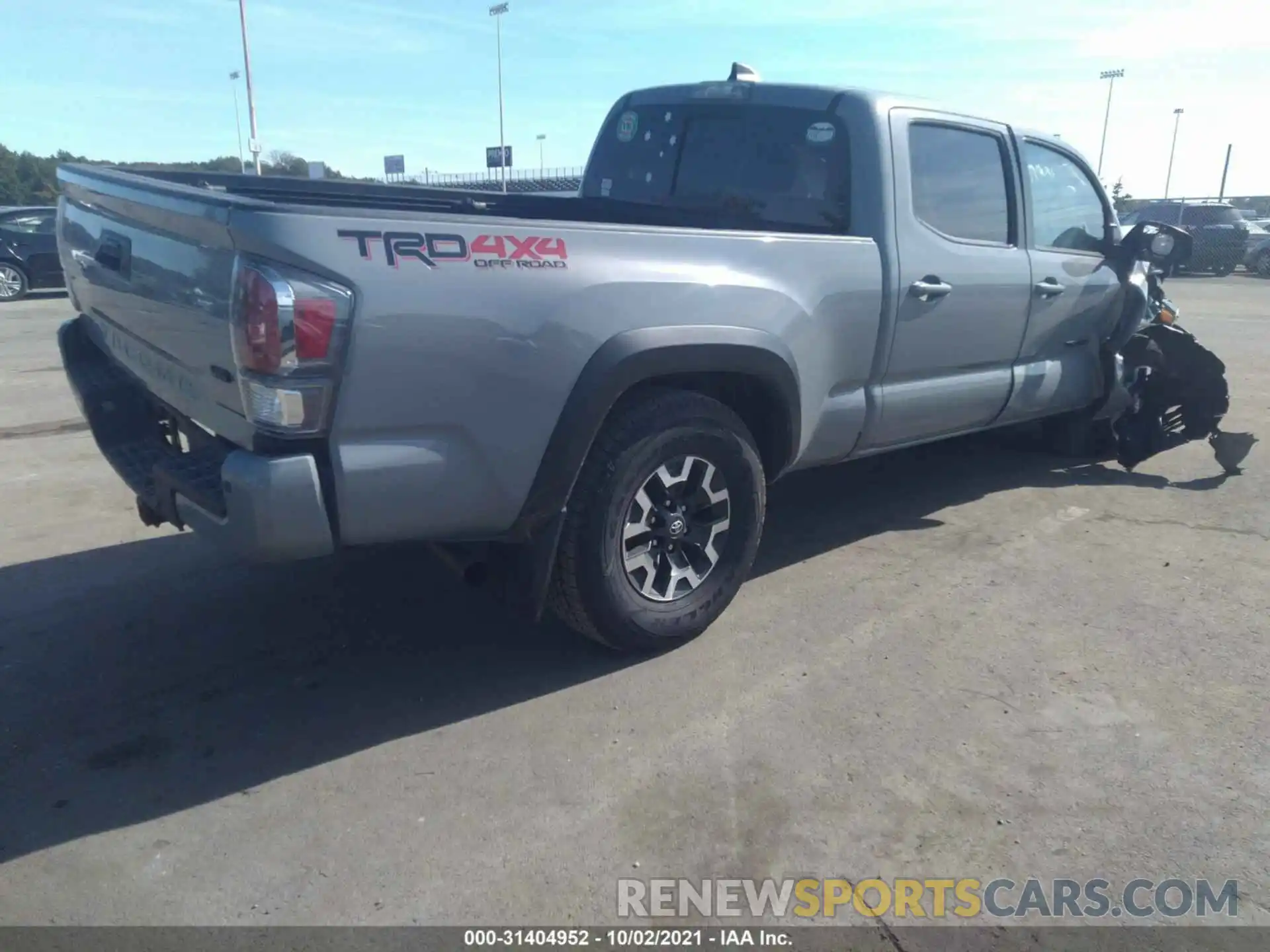 4 Photograph of a damaged car 3TYDZ5BN5MT002217 TOYOTA TACOMA 4WD 2021