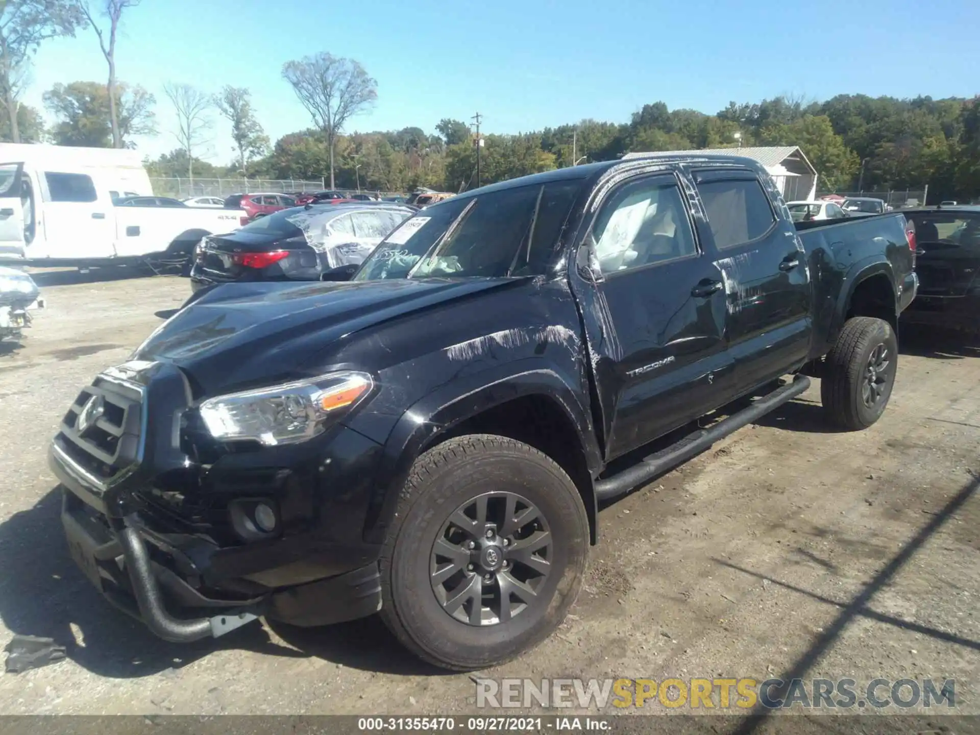 2 Photograph of a damaged car 3TYDZ5BN7MT001411 TOYOTA TACOMA 4WD 2021