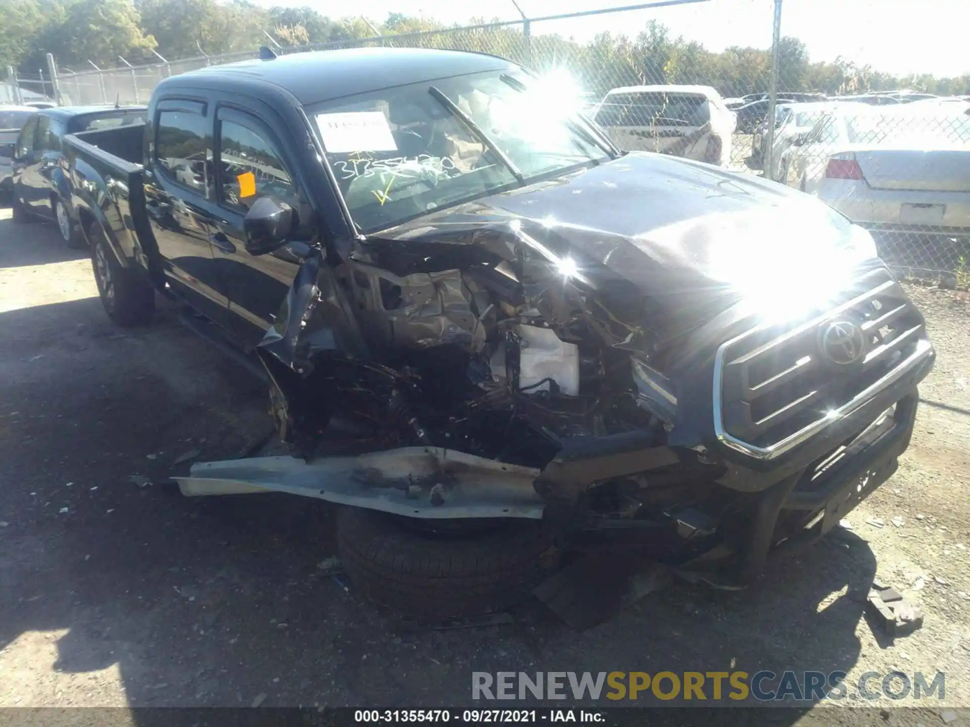 6 Photograph of a damaged car 3TYDZ5BN7MT001411 TOYOTA TACOMA 4WD 2021