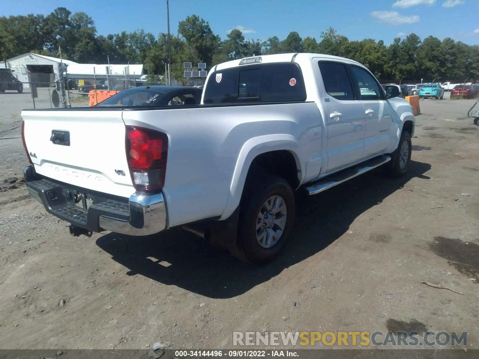 4 Photograph of a damaged car 3TYDZ5BN7MT002008 TOYOTA TACOMA 4WD 2021