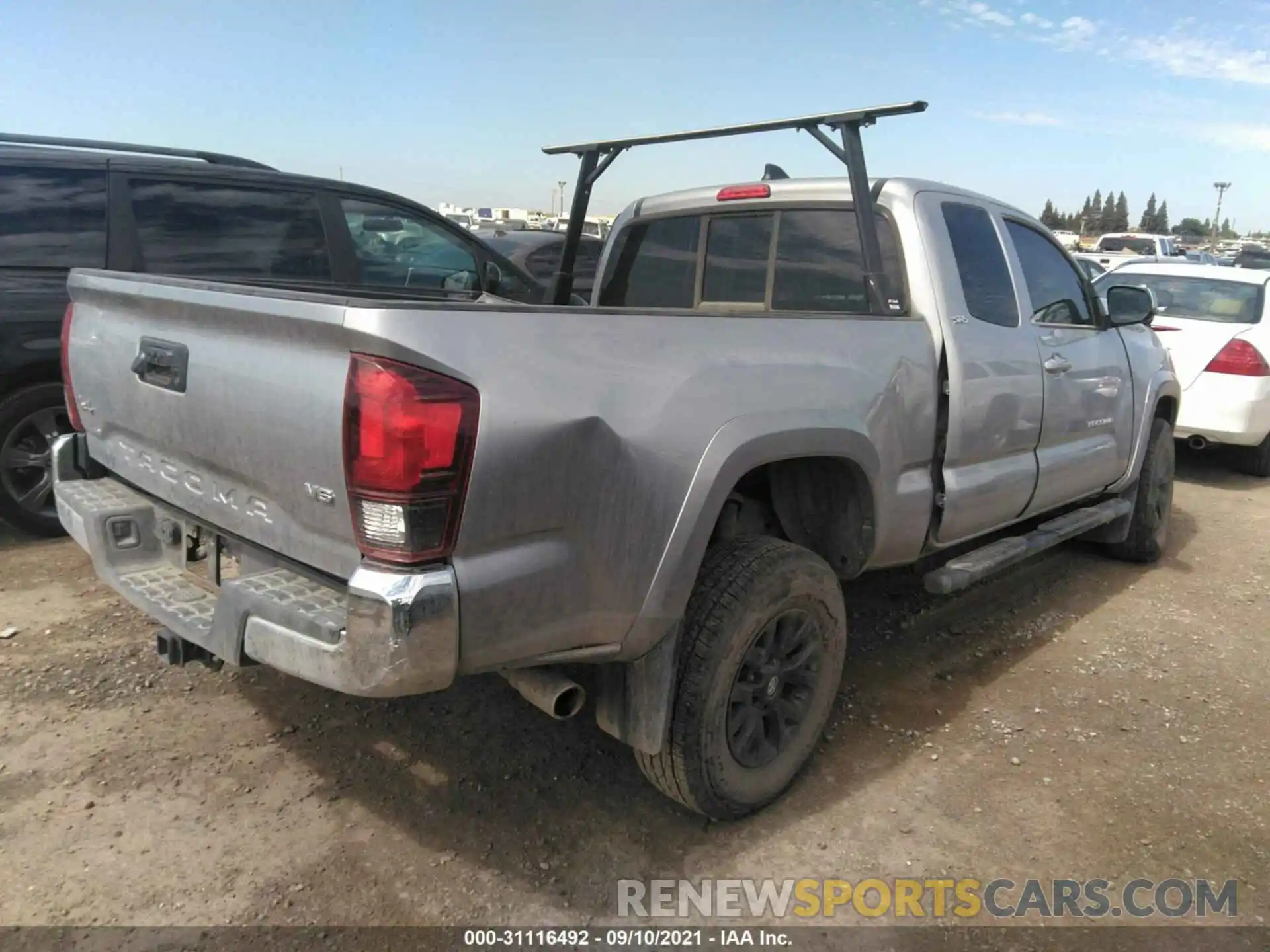 4 Photograph of a damaged car 3TYSZ5AN3MT009689 TOYOTA TACOMA 4WD 2021