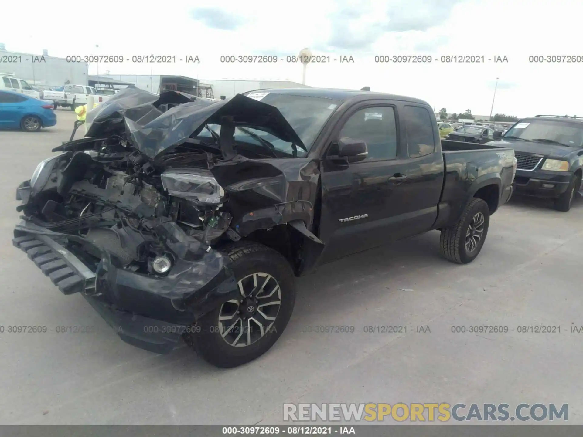 2 Photograph of a damaged car 3TYSZ5AN7MT012921 TOYOTA TACOMA 4WD 2021