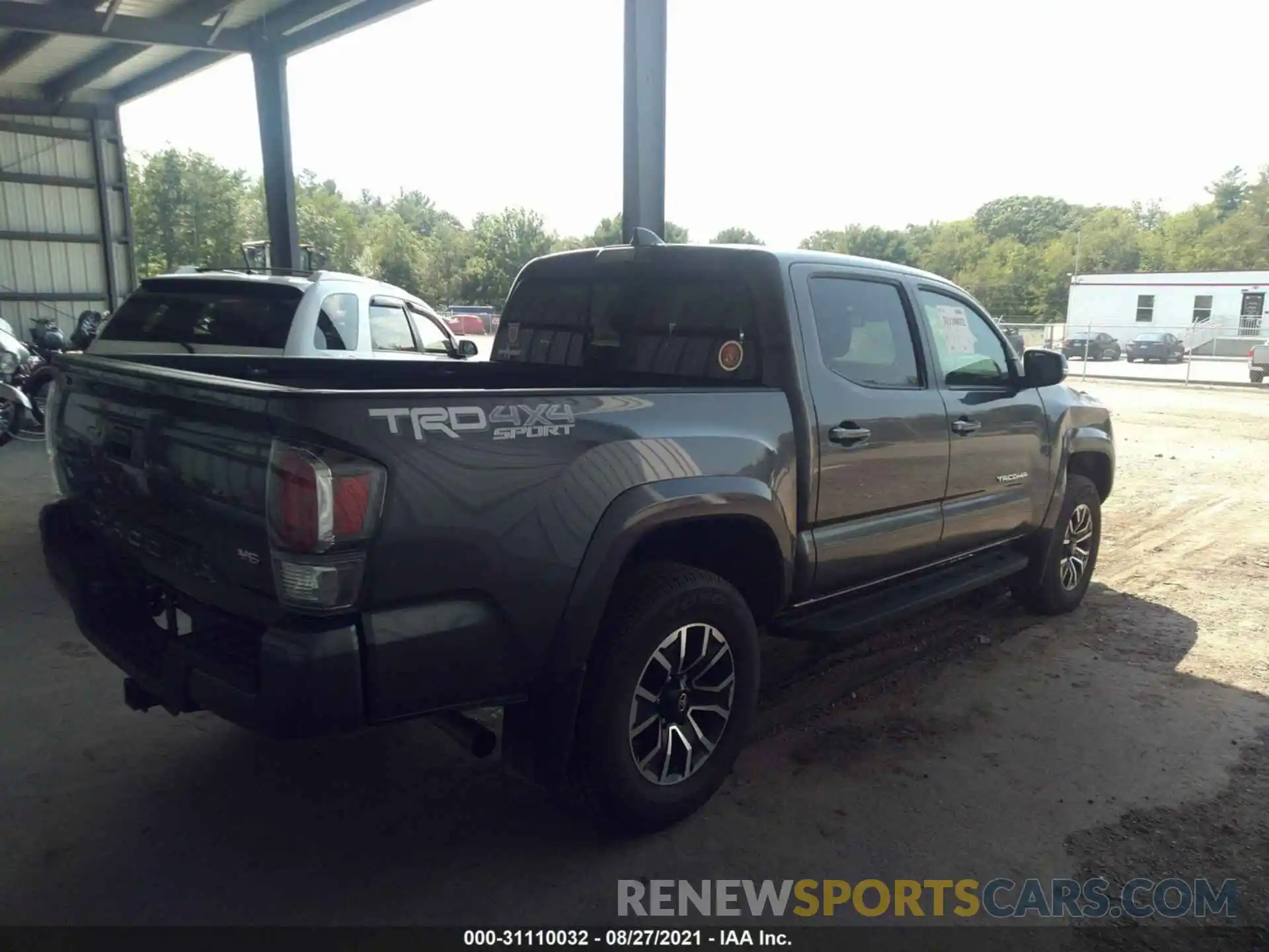 4 Photograph of a damaged car 5TFCZ5AN0MX246554 TOYOTA TACOMA 4WD 2021