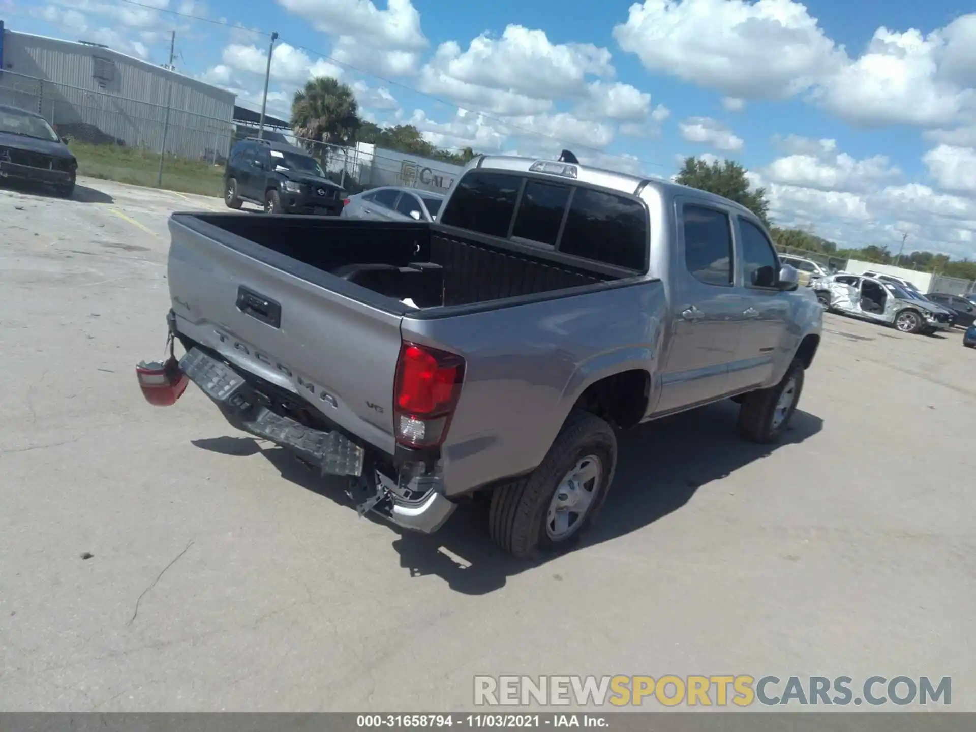 4 Photograph of a damaged car 5TFCZ5AN0MX252936 TOYOTA TACOMA 4WD 2021