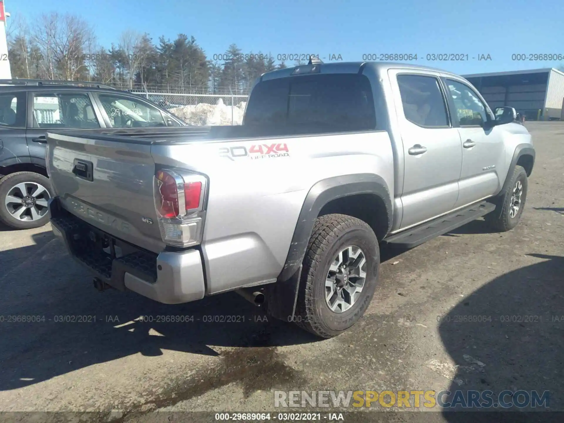 4 Photograph of a damaged car 5TFCZ5AN0MX256999 TOYOTA TACOMA 4WD 2021