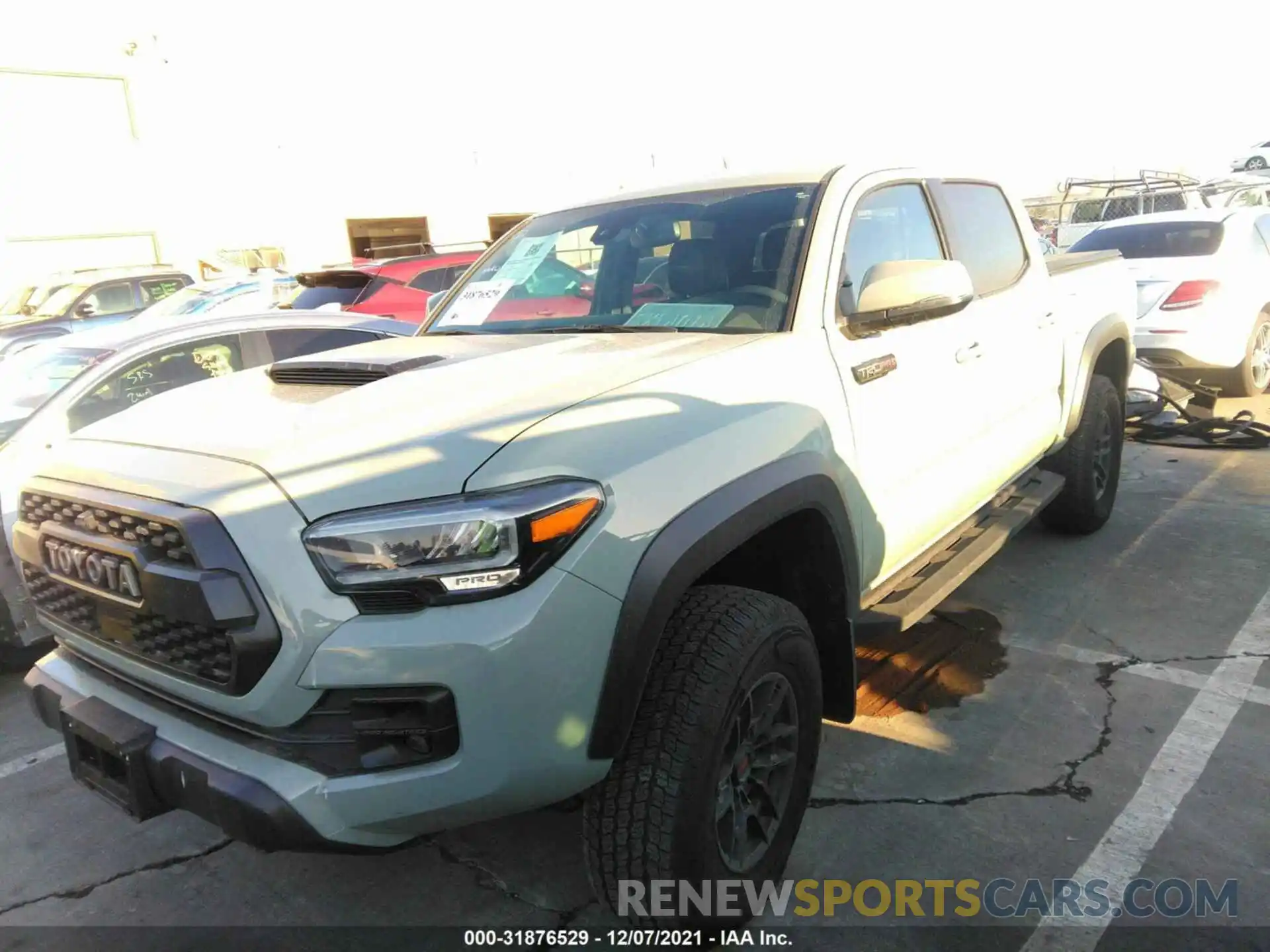 2 Photograph of a damaged car 5TFCZ5AN0MX264729 TOYOTA TACOMA 4WD 2021