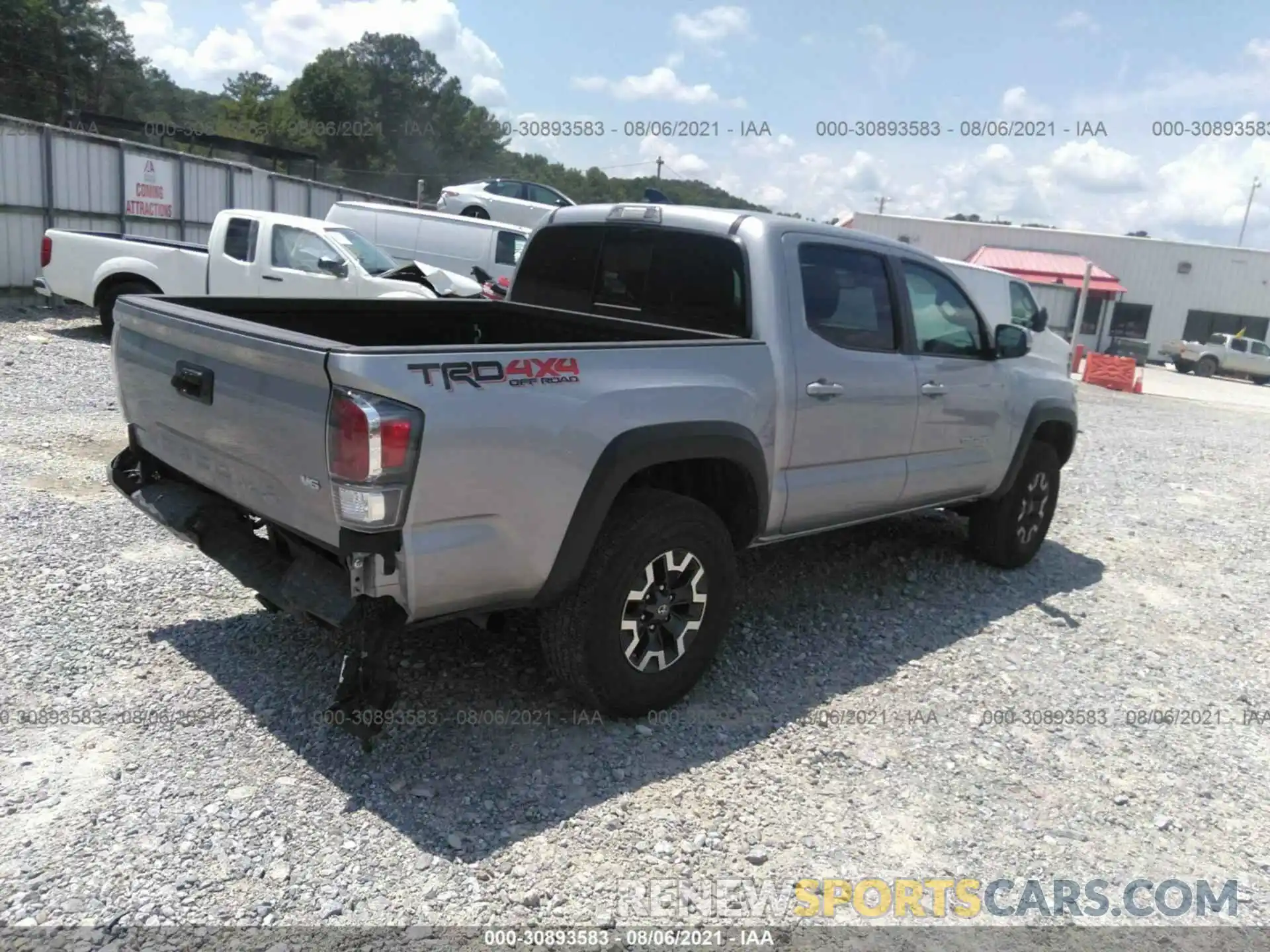 4 Photograph of a damaged car 5TFCZ5AN0MX268070 TOYOTA TACOMA 4WD 2021