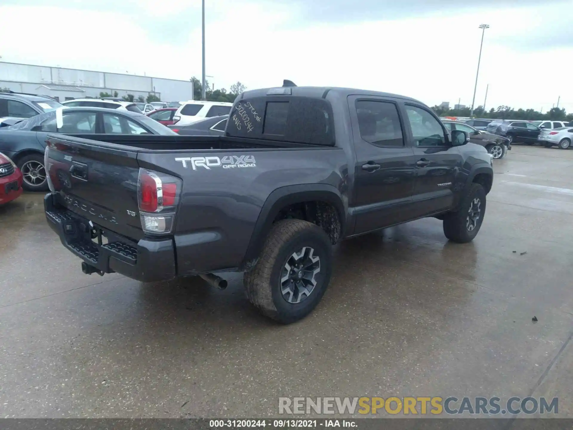 4 Photograph of a damaged car 5TFCZ5AN0MX271812 TOYOTA TACOMA 4WD 2021